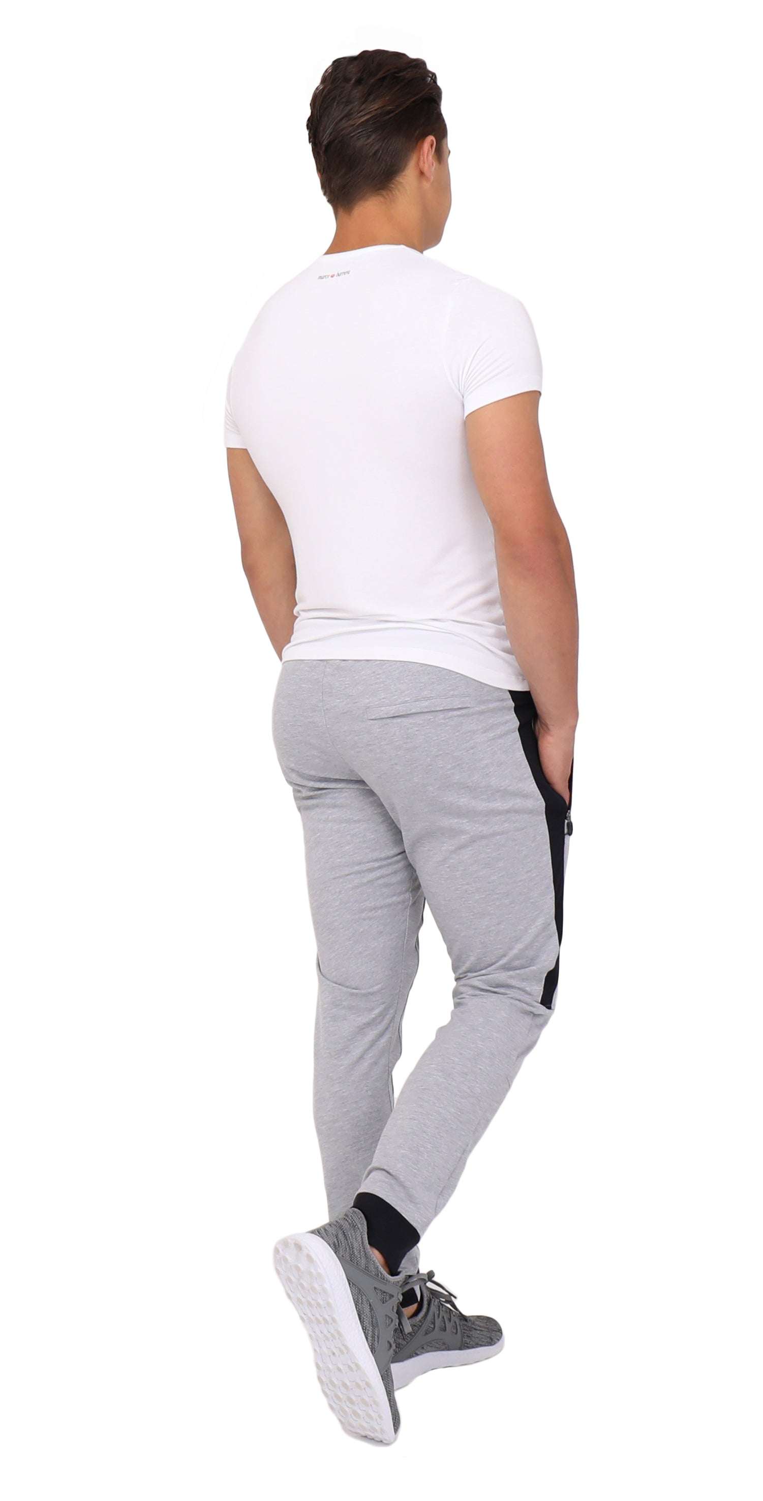Infinite Flex Jogger in light grey stretch fabric, featuring cuffed ankles and black side pocket trim