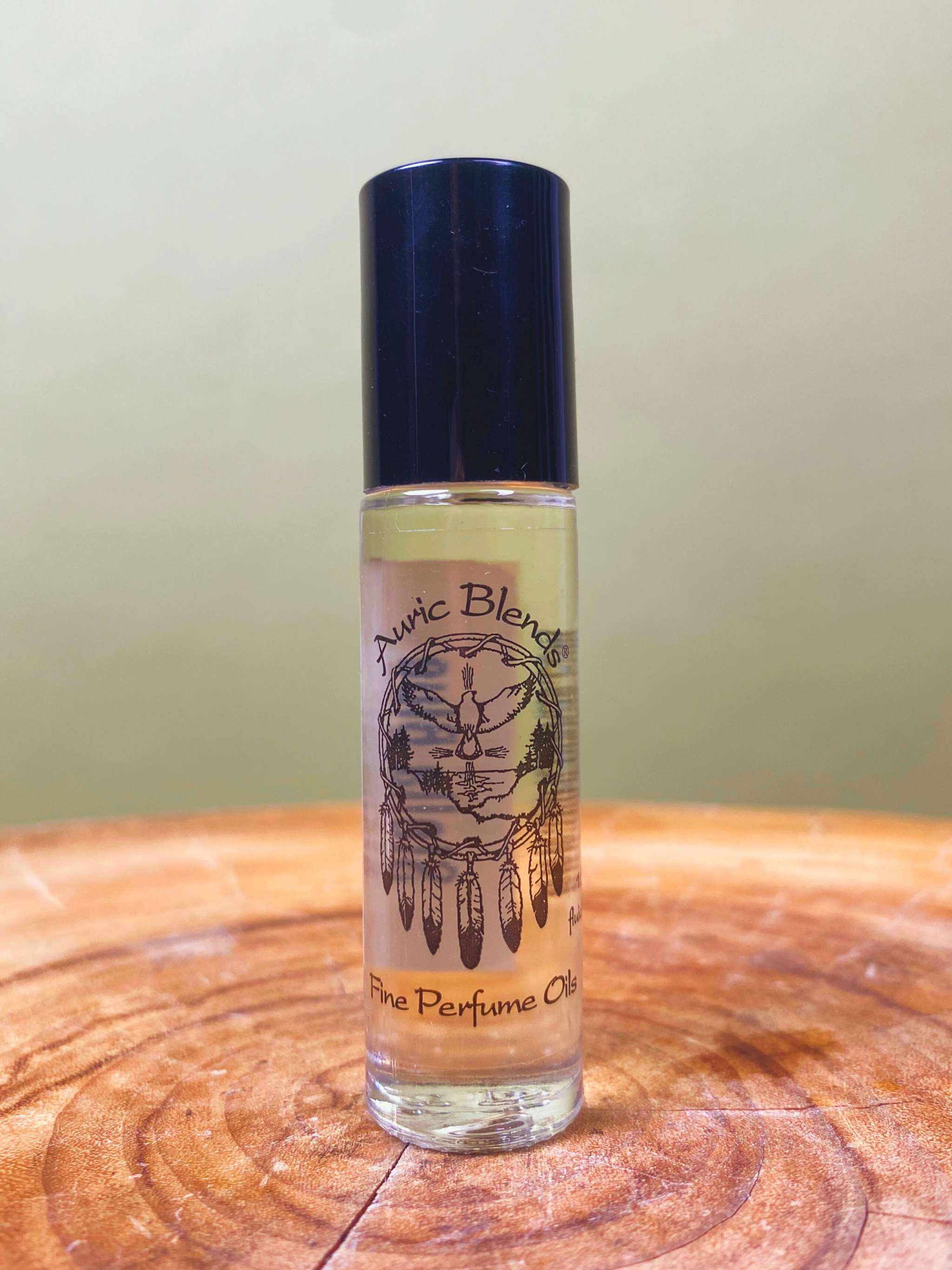 Jasmine roll-on perfume oil bottle with floral scent notes