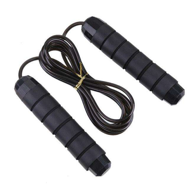 Jump Ropes With Electronic Counting featuring black rubber cord and ergonomic black foam handles with segmented grip design.