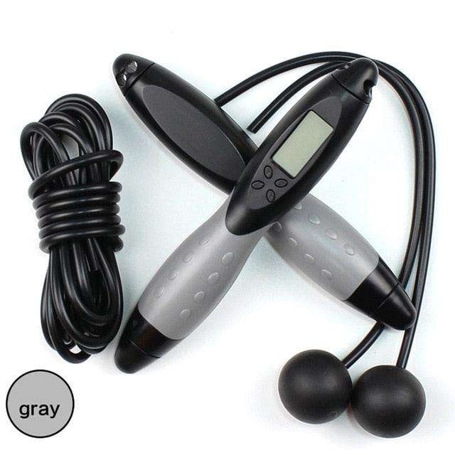 Jump Ropes With Electronic Counting featuring gray ergonomic handles with anti-slip grips and a digital display for tracking jumps and calories.