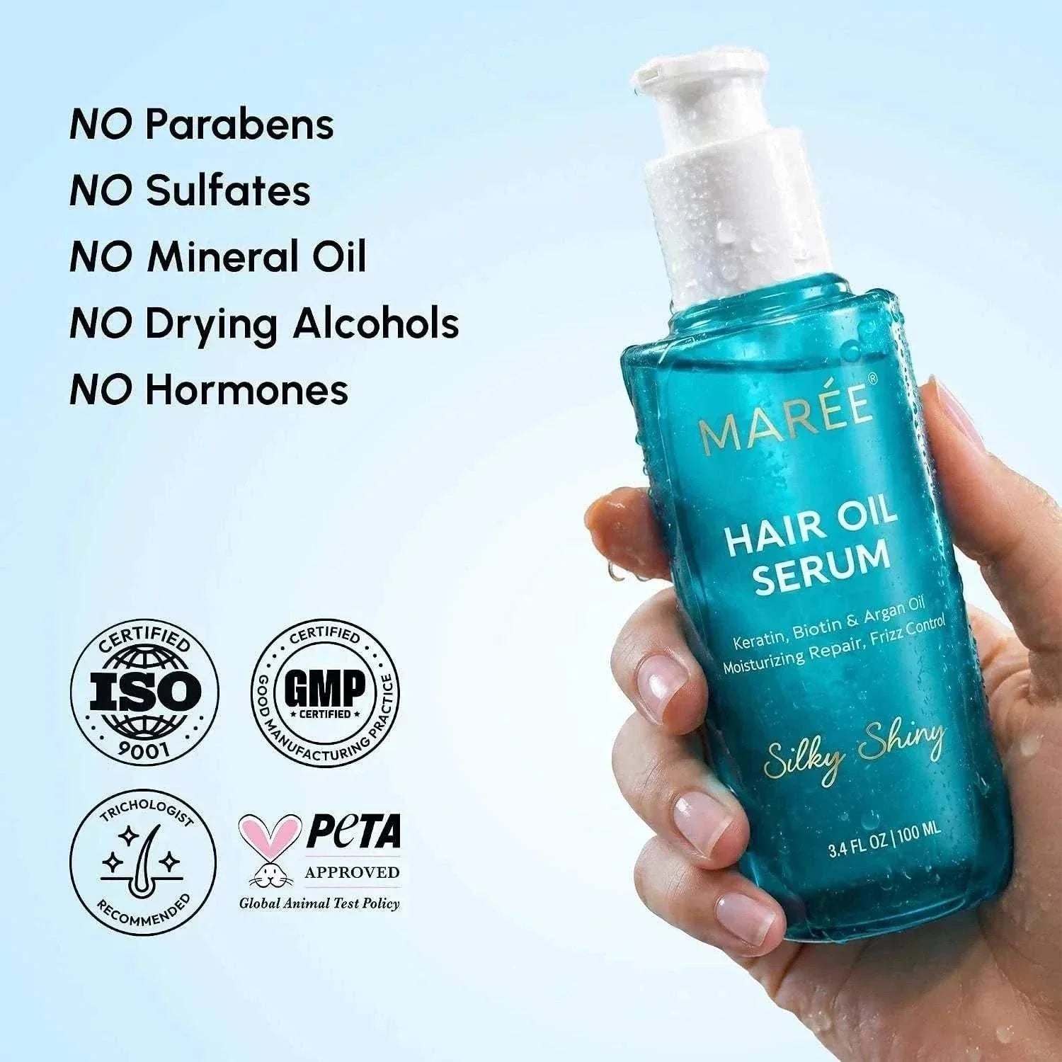 keratin oil serum bottle with smooth shiny hair