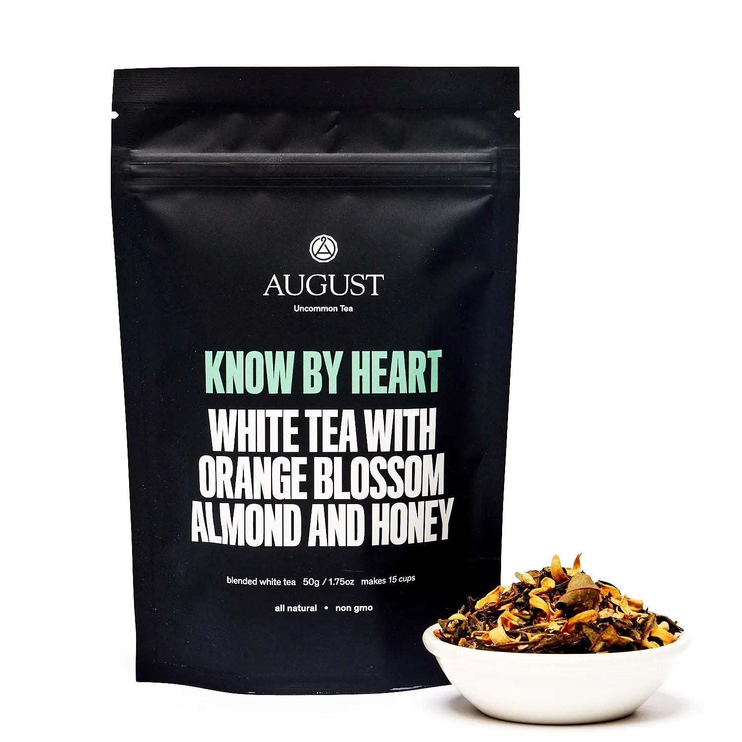 Know by Heart white tea in a black pouch, paired with loose tea featuring orange blossom, almond and honey