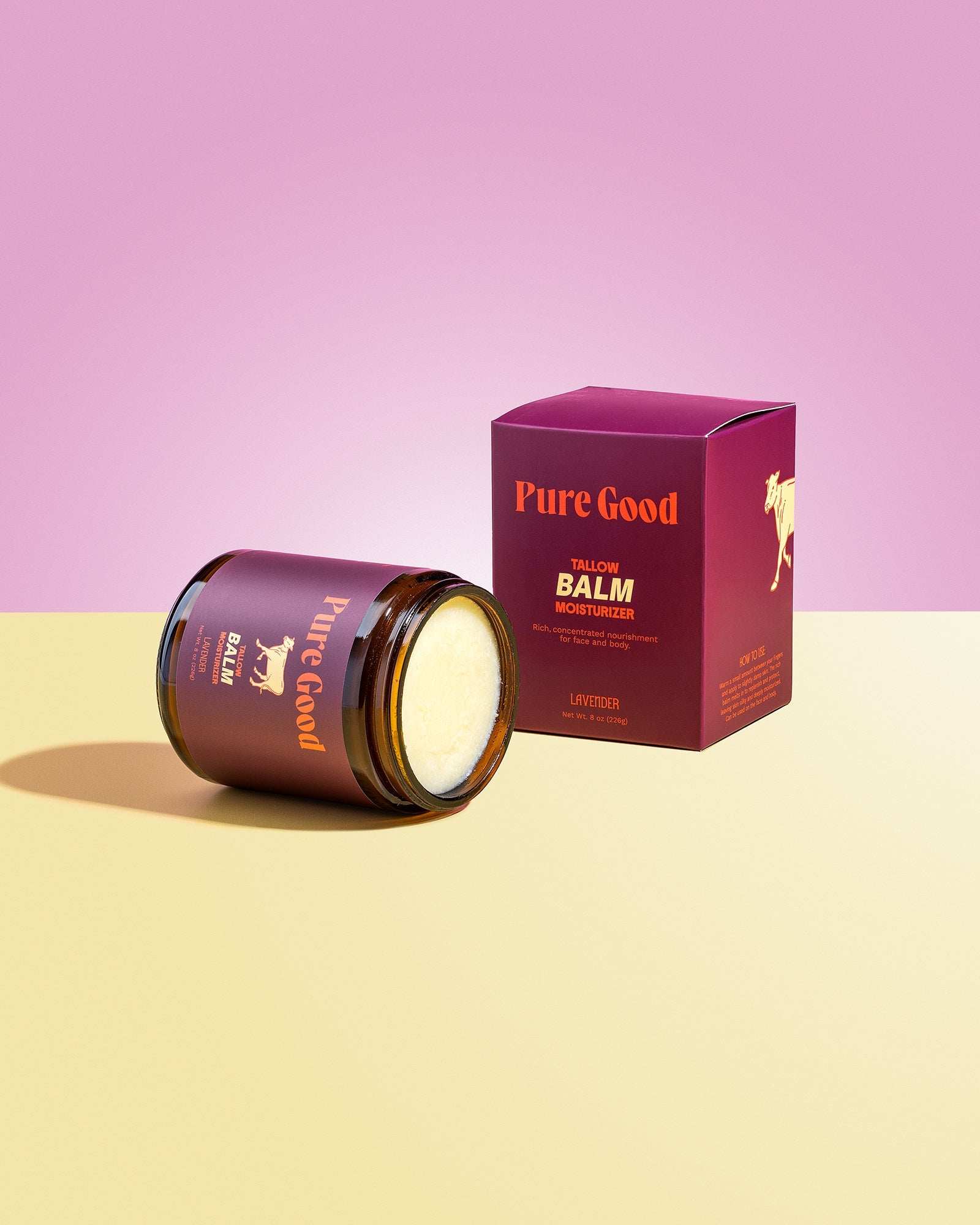 Lavender Tallow Balm in a burgundy jar and matching box, with creamy balm visible and lavender label