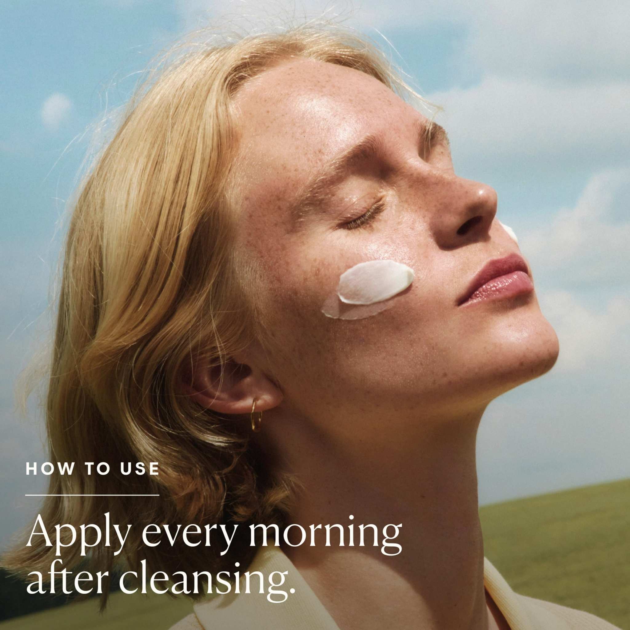 Facial moisturizer, Lightweight anti-wrinkle daily facial moisturizer, white cream applied to woman's cheek
