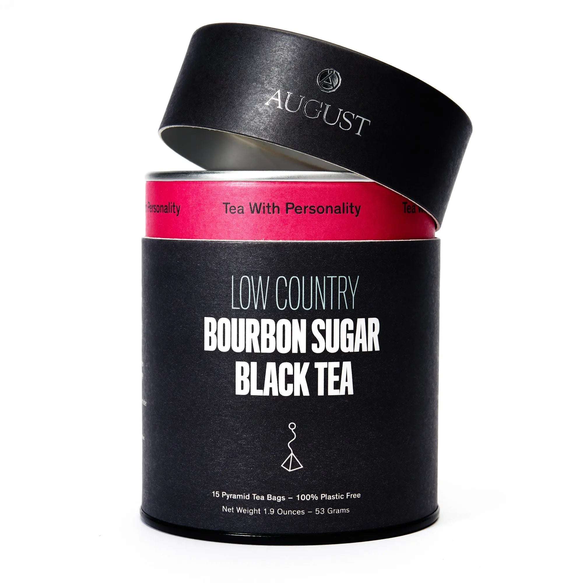 Low Country black tea in a black cylindrical tin with a vivid pink band, labeled Bourbon Sugar Black Tea