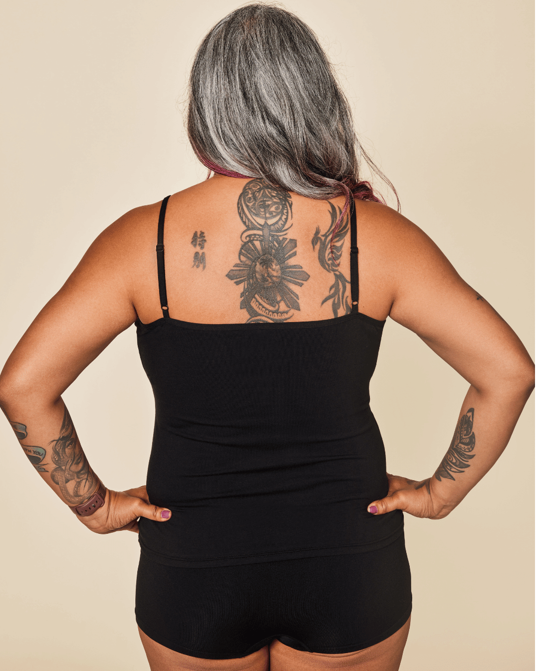 Luna - Cotton Cami in black cotton with thin adjustable straps and a simple fitted design, shown from the back