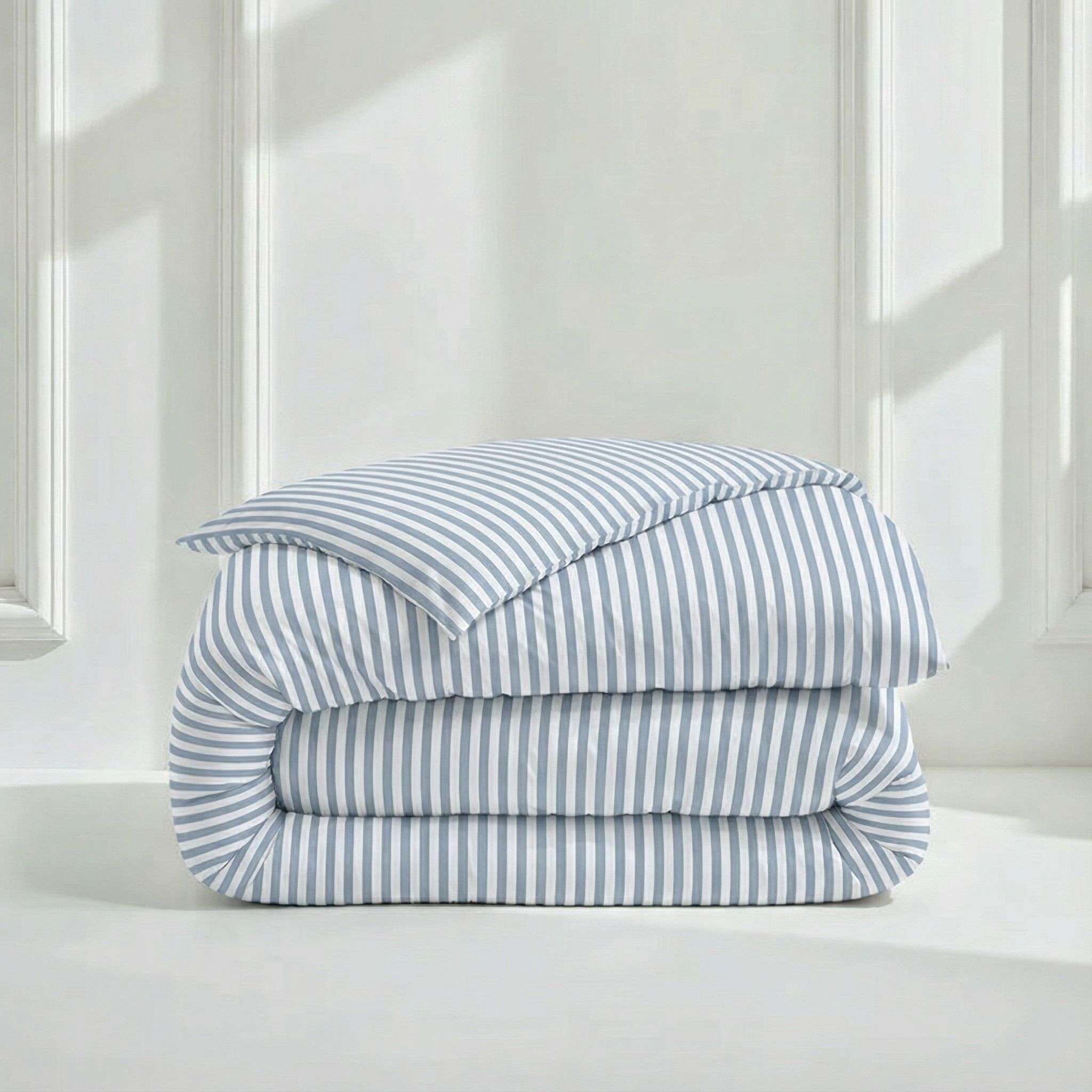 Luxe Australian Sateen Bedding duvet cover in blue and white stripes, folded in soft cotton sateen