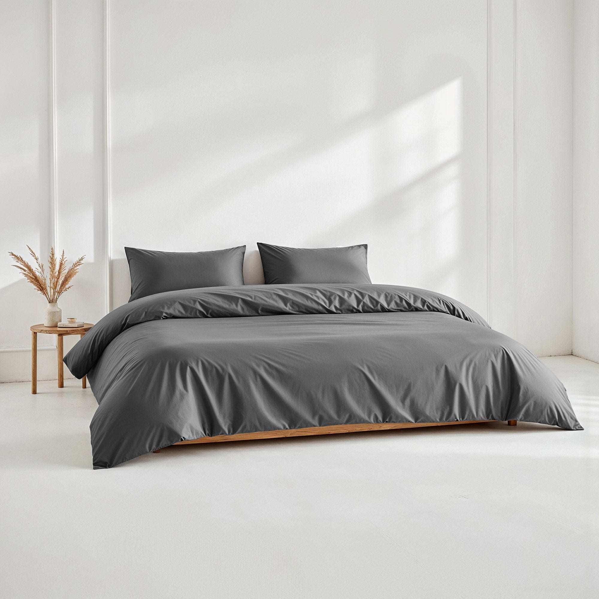 Luxe Australian Sateen Bedding in charcoal gray cotton with a smooth, solid-color duvet cover and matching pillowcases