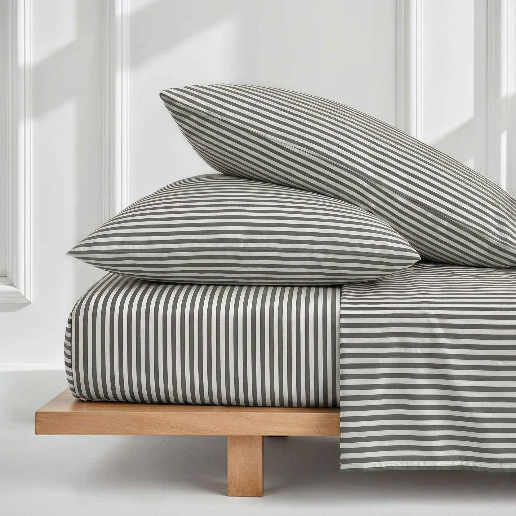 Luxe Australian Sateen Bedding in crisp cotton with fine charcoal and white stripes across sheets and pillowcases