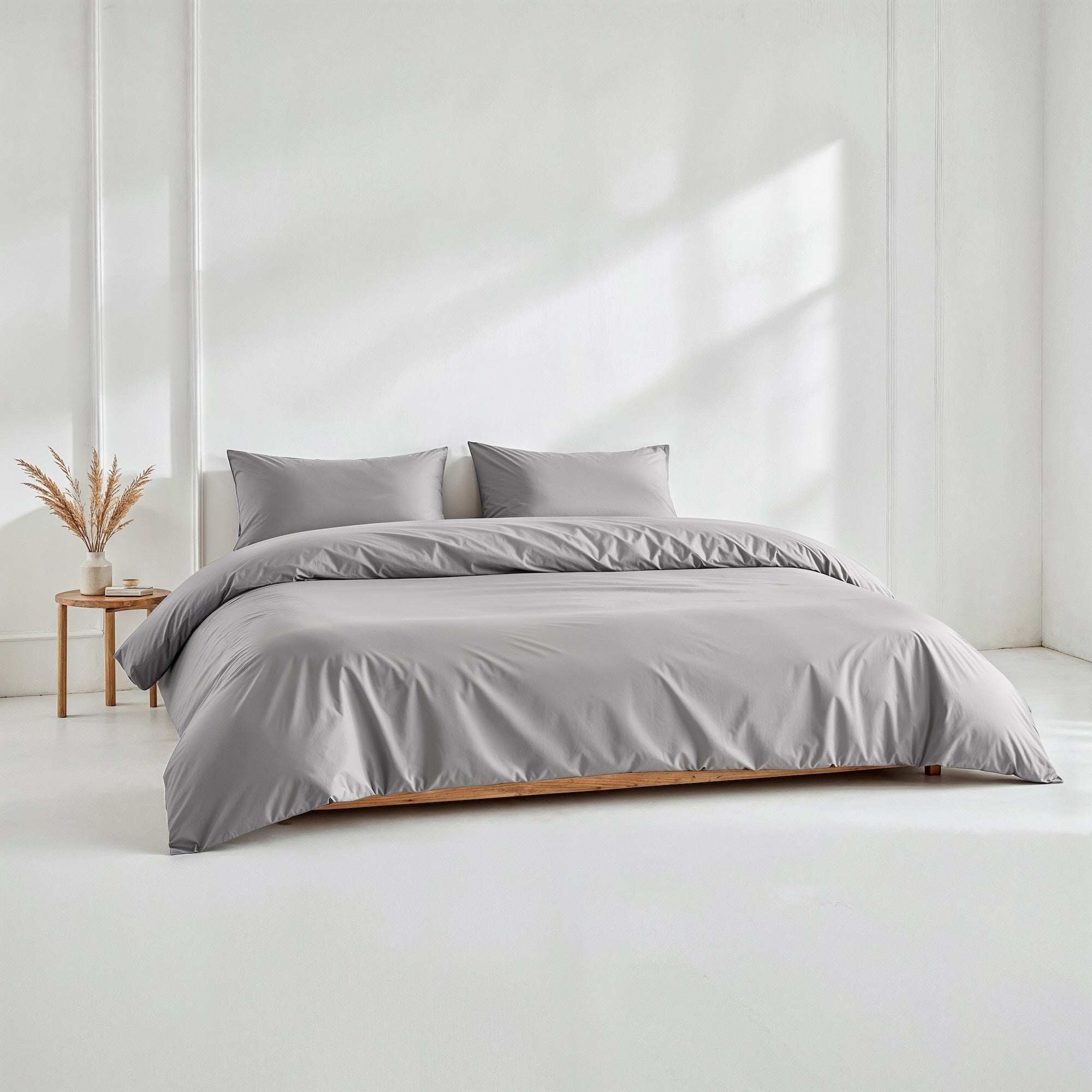 Luxe Australian Sateen Bedding in smooth solid grey cotton, featuring a duvet cover and matching pillowcases