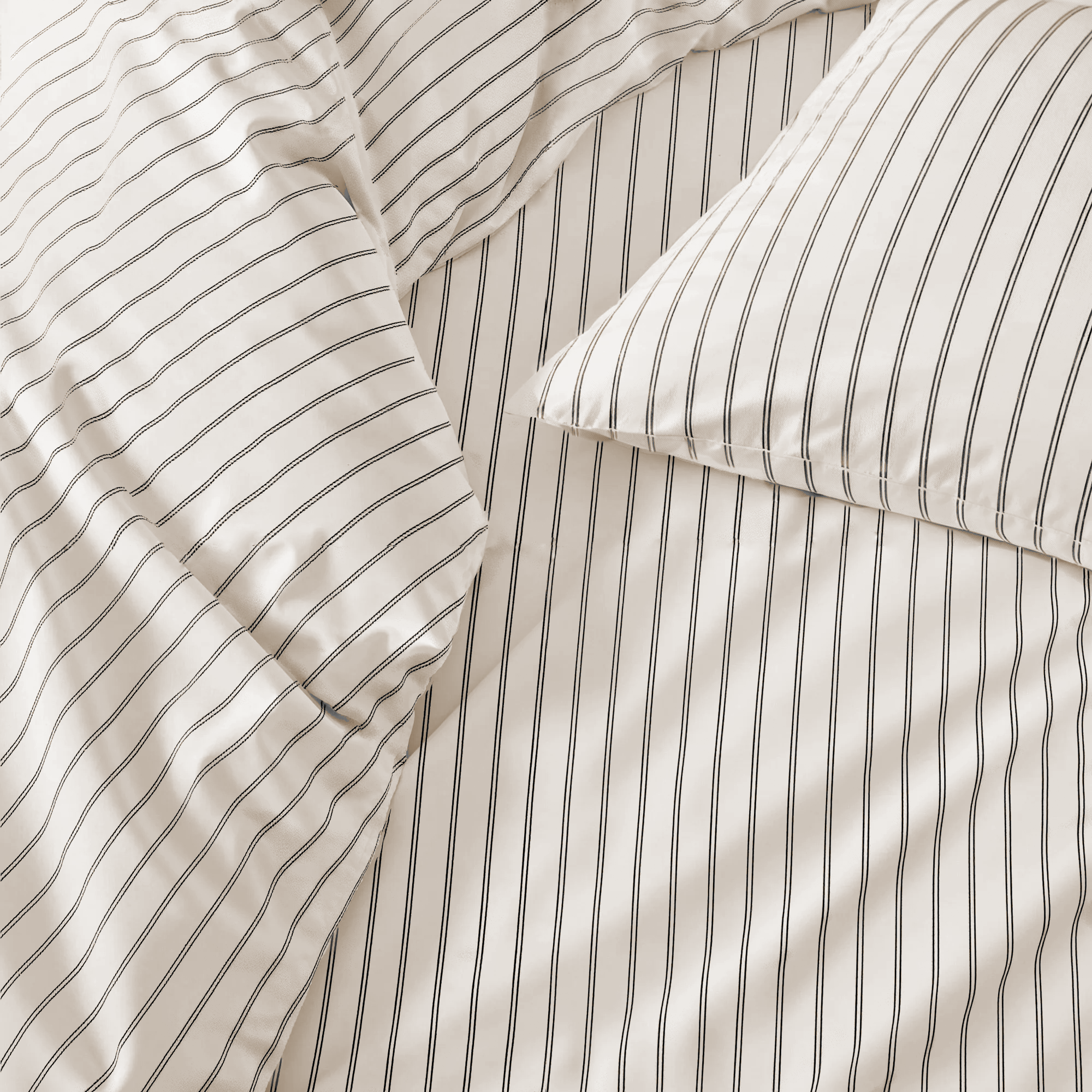 Luxe Australian Sateen Bedding in ivory cotton with fine charcoal pinstripes and a smooth sateen finish