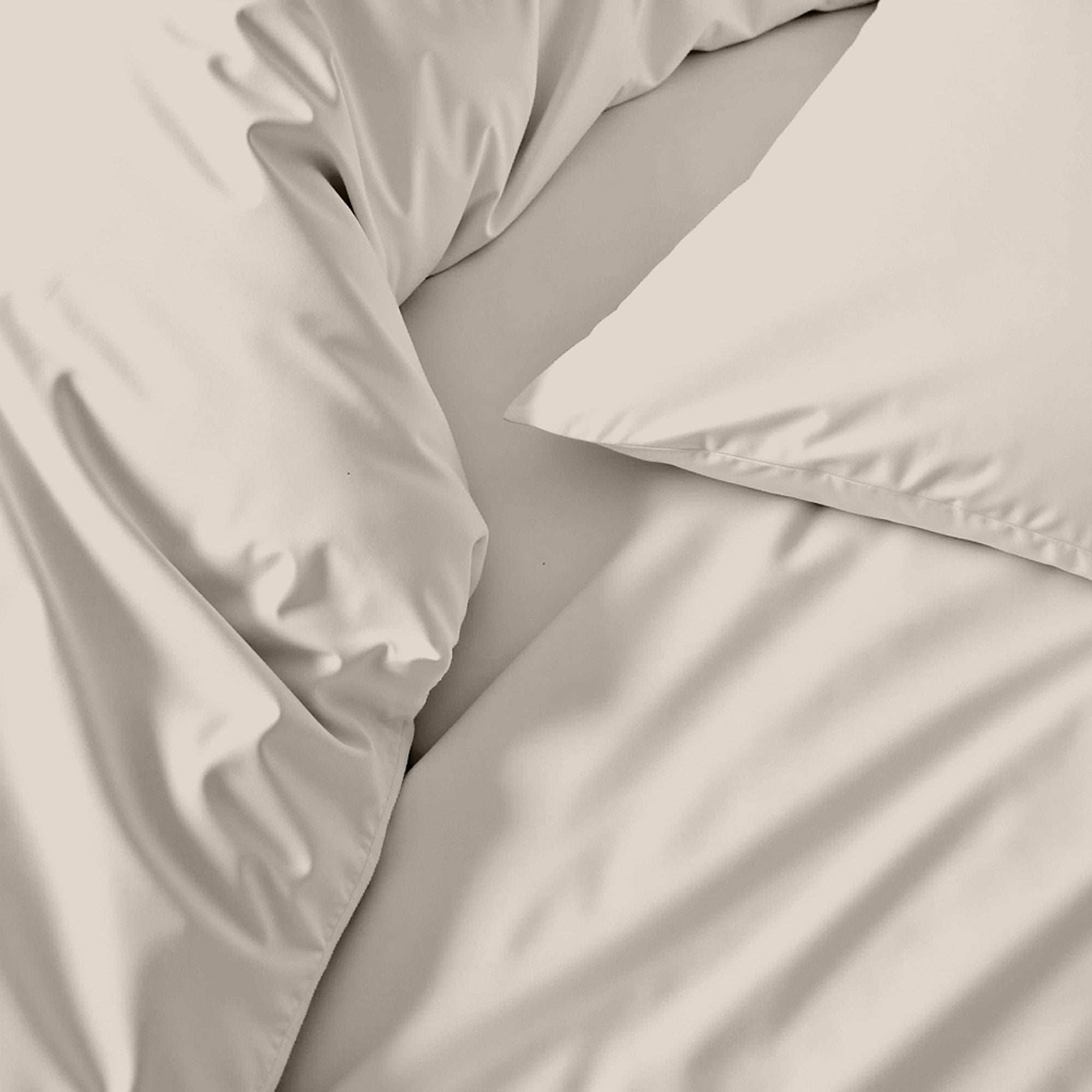 Luxe Australian Sateen Bedding in soft ivory cotton with a smooth, lustrous finish and relaxed folds