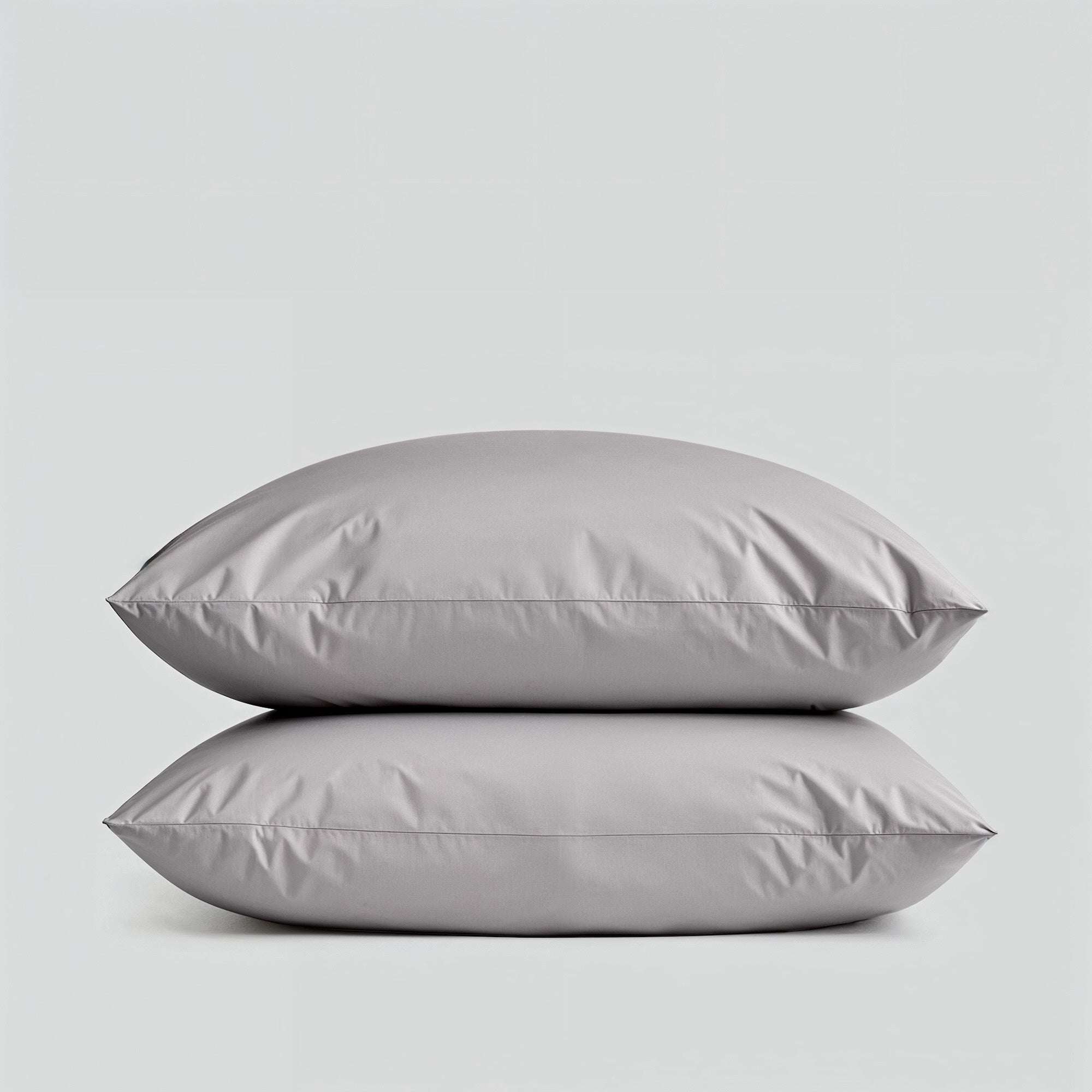 Luxe Australian Sateen Bedding pillowcases in smooth light grey cotton with clean seams and a subtle sheen