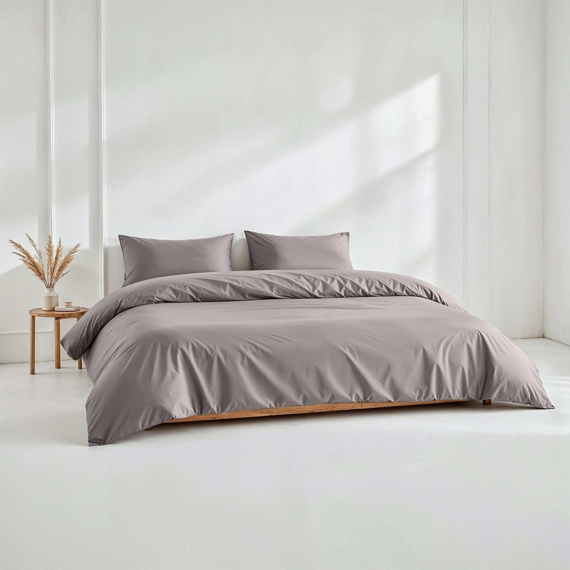 Luxe Australian Sateen Bedding in smooth solid taupe cotton, with a matching duvet cover and pillowcases
