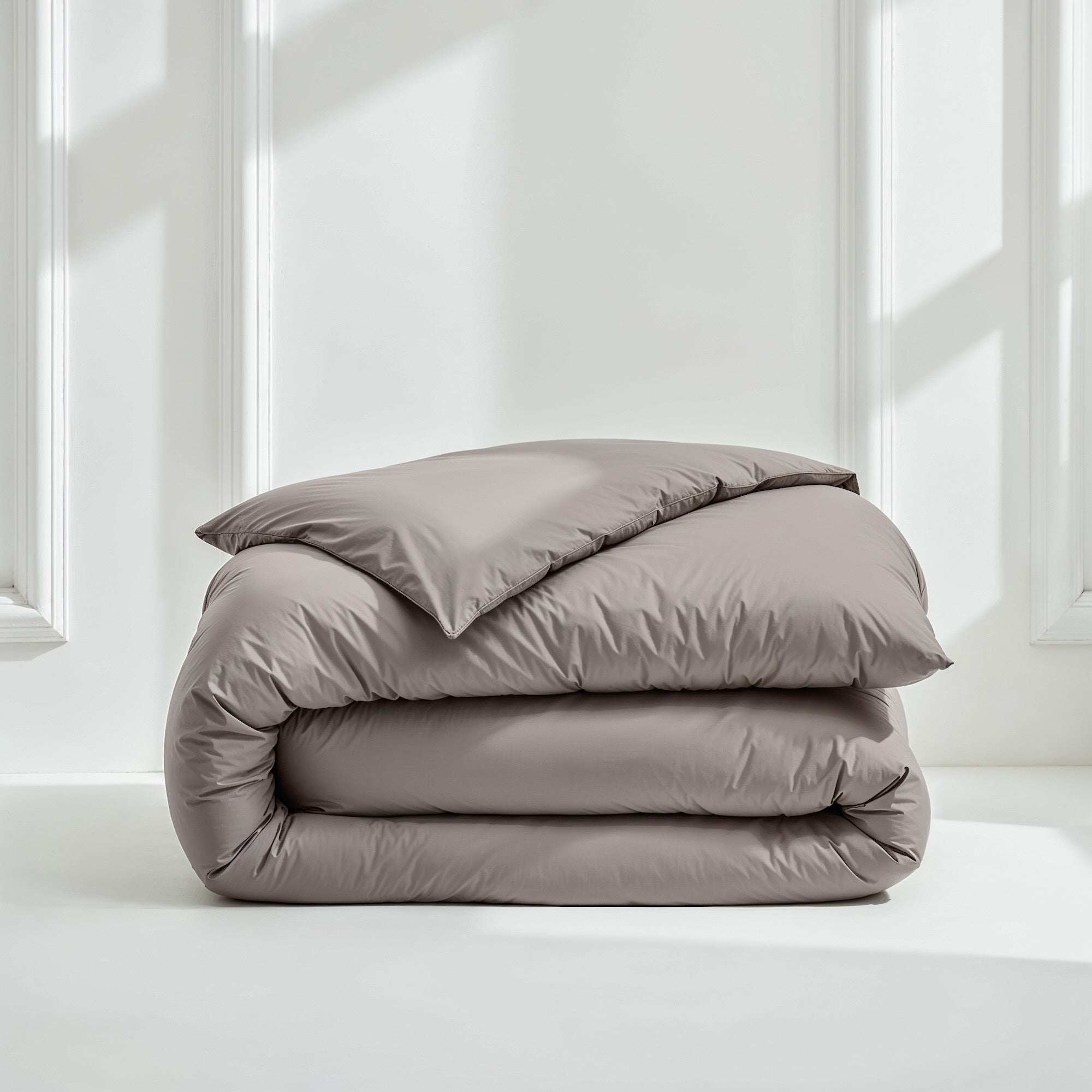 Luxe Australian Sateen Bedding bundle of smooth taupe cotton, neatly folded duvet cover and pillowcases with a soft sheen