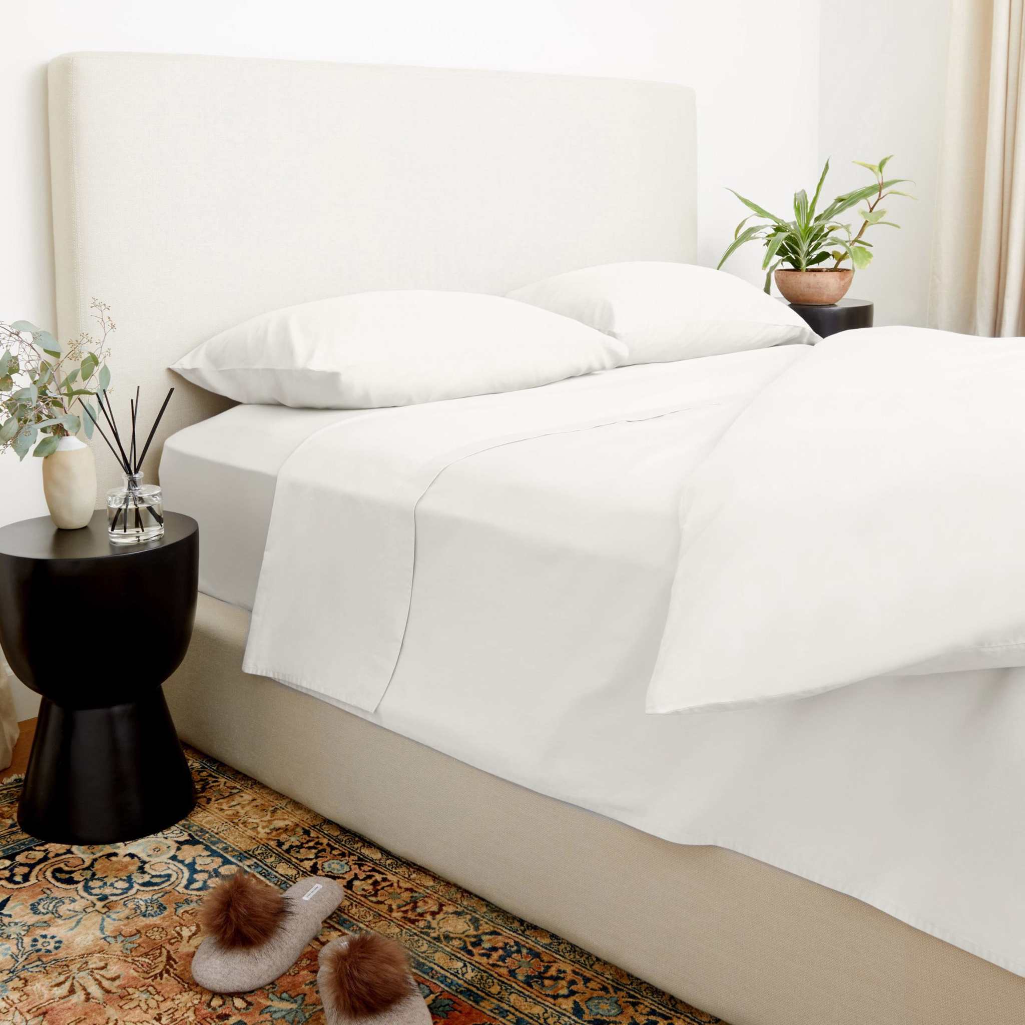 Luxe Australian Sateen Bedding in crisp white cotton with a smooth, lustrous finish, dressed across a bed
