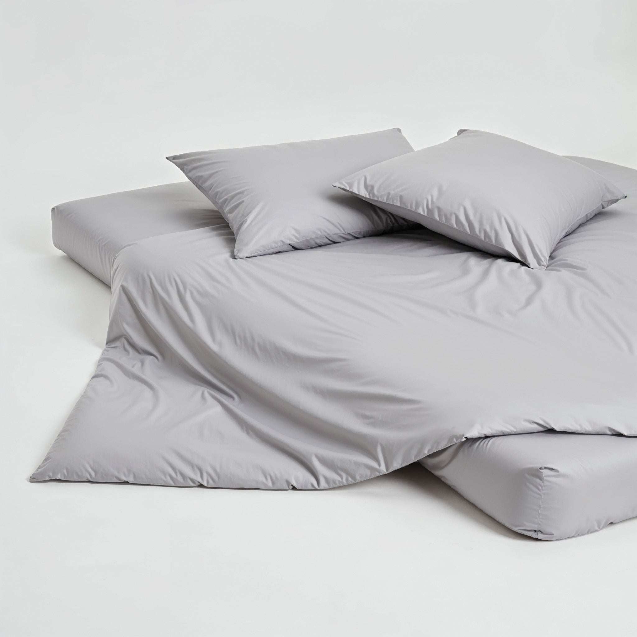 Duvet cover in Luxe Australian Sateen, smooth light grey cotton with a subtle sheen and matching pillowcases