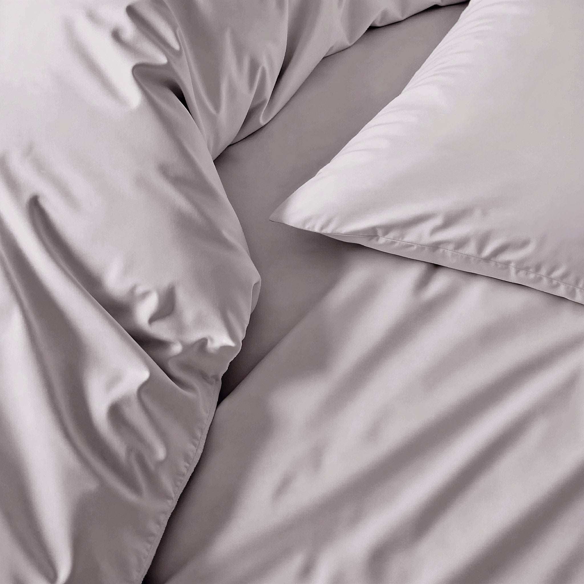 Luxe Australian Sateen duvet cover in solid pale lavender cotton with a smooth, softly lustrous finish