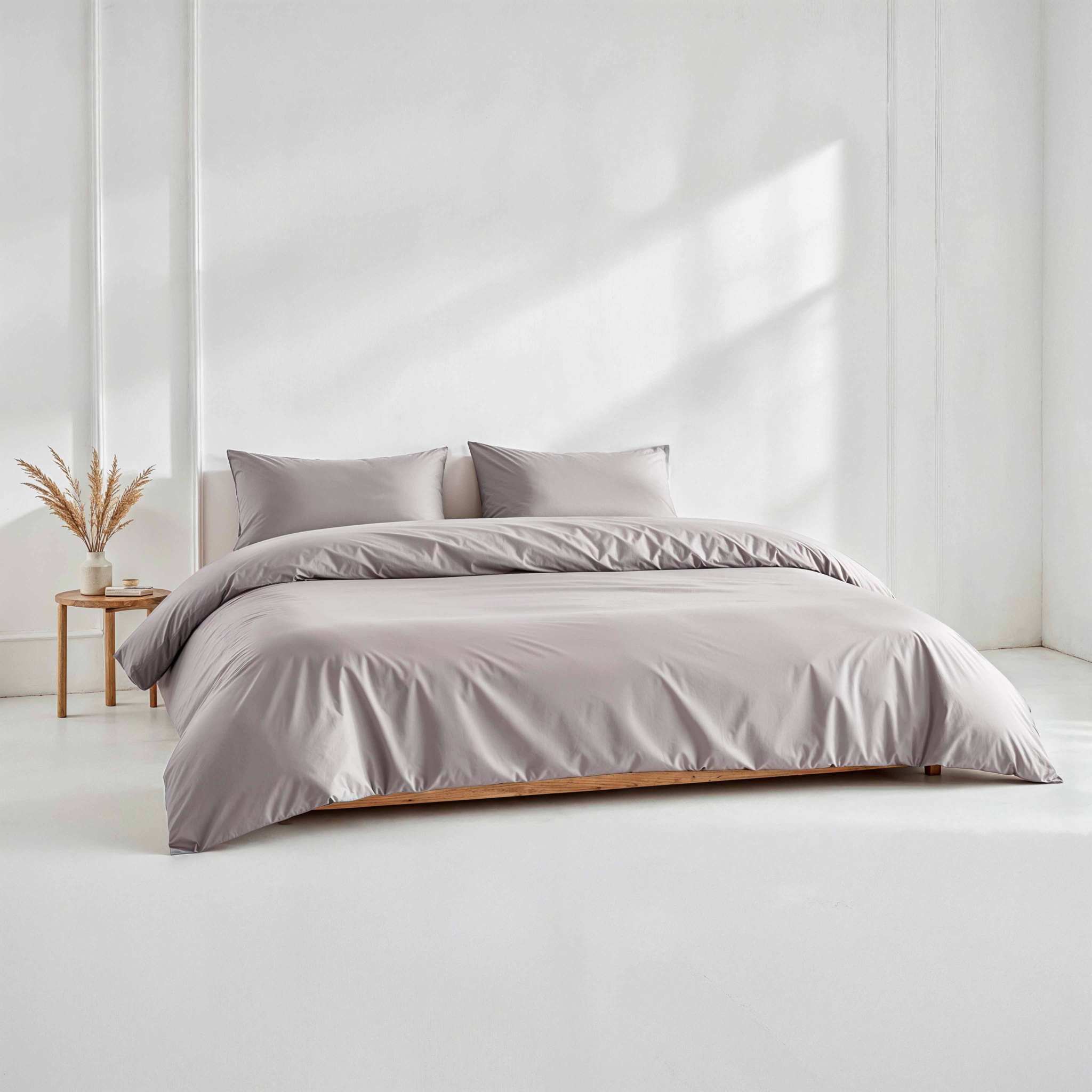 Luxe Australian Sateen duvet cover in solid pale taupe cotton with a smooth, subtle sheen and hidden button closure
