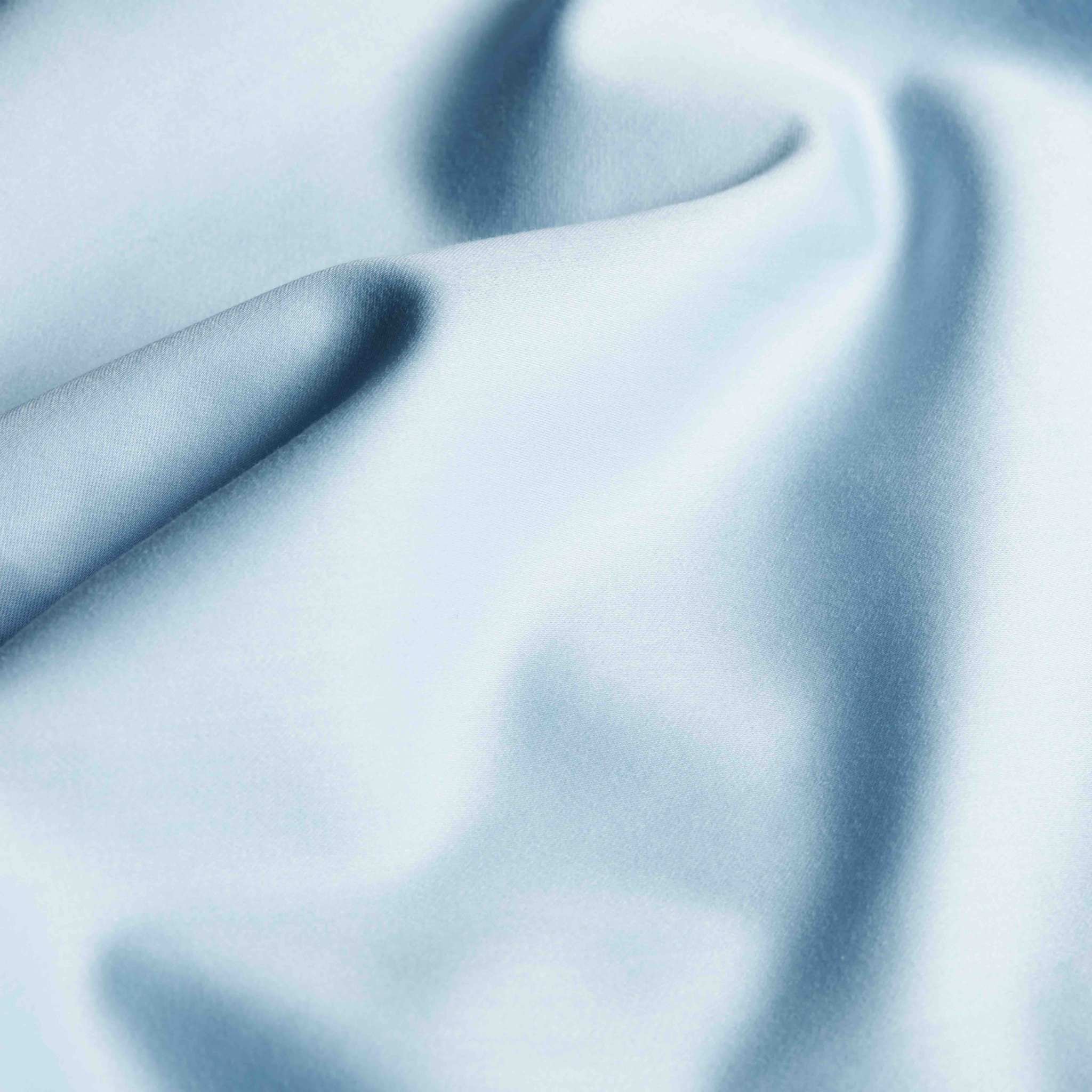 Luxe Australian Sateen Pillowcase Set in pale blue cotton with a smooth, silky sateen weave and soft folds