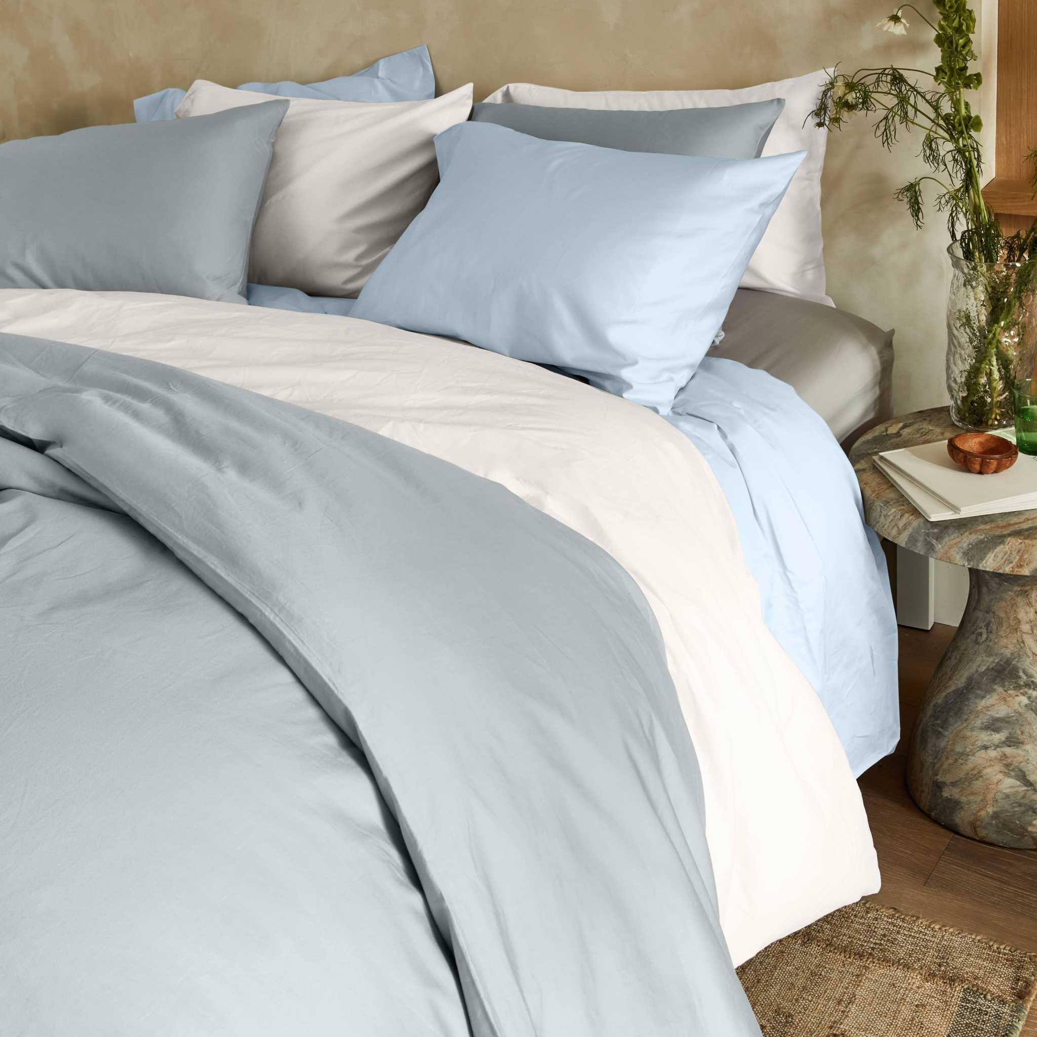 Luxe Australian Sateen Pillowcase Set in smooth pale blue and white cotton sateen with a silky sheen