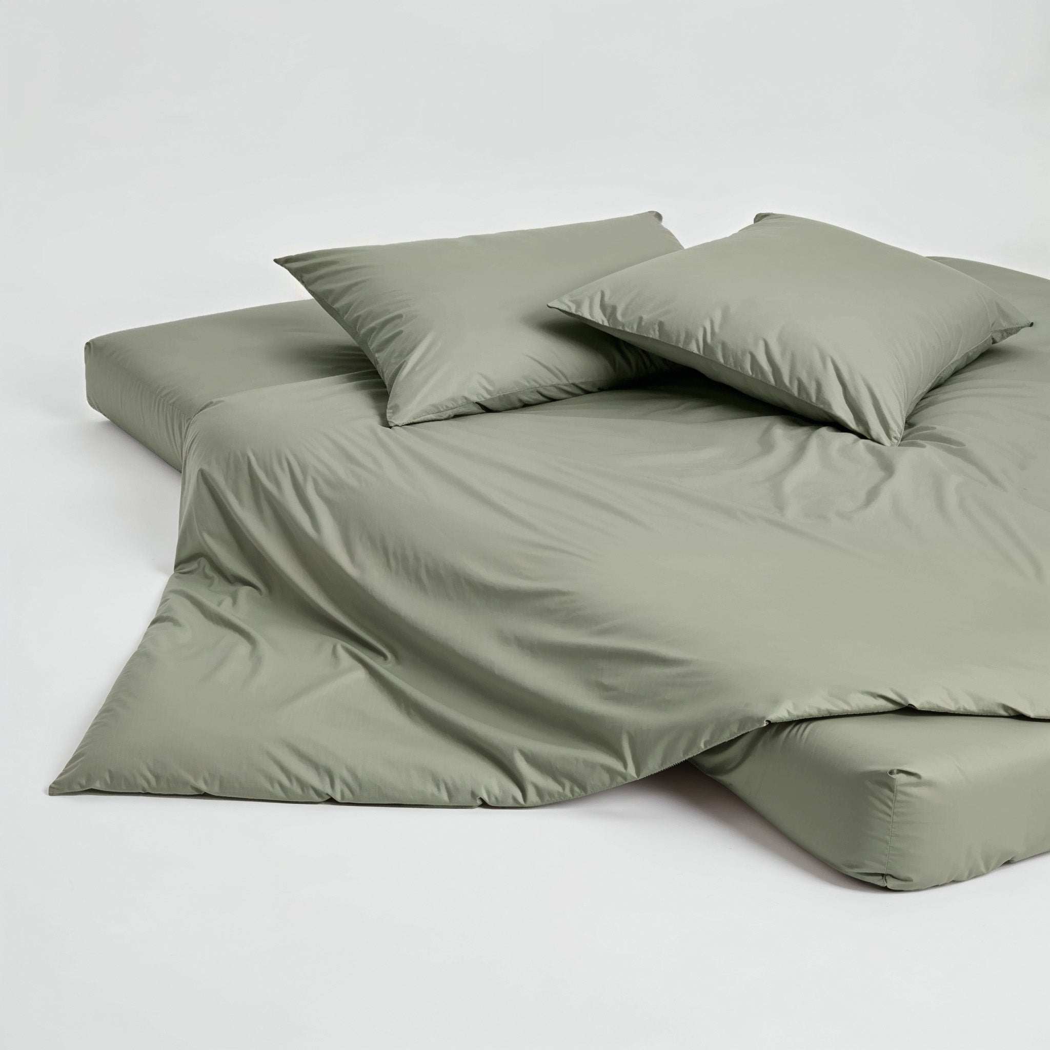 Luxe Australian Sateen Pillowcase Set in muted sage green, smooth solid-colour sateen with two matching pillowcases