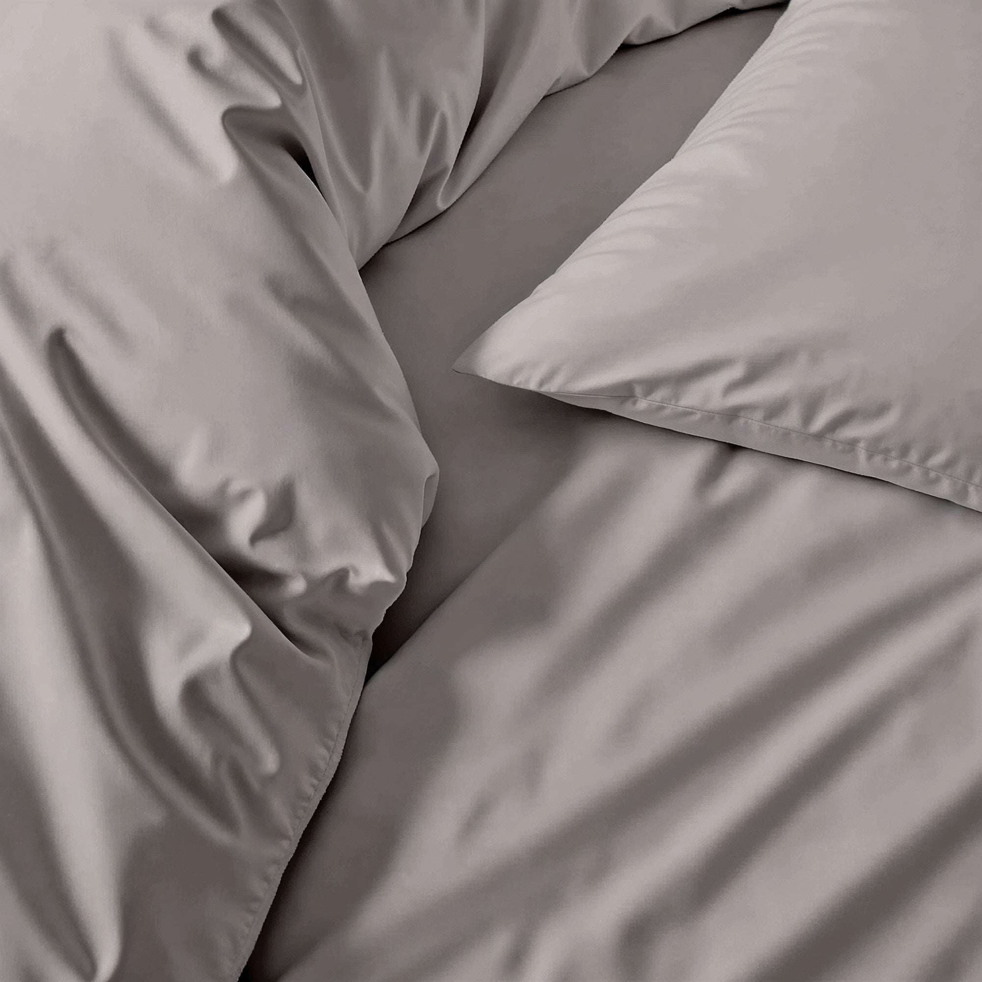 Luxe Australian Sateen Pillowcase Set in solid taupe cotton sateen with a smooth, silky finish and envelope closure