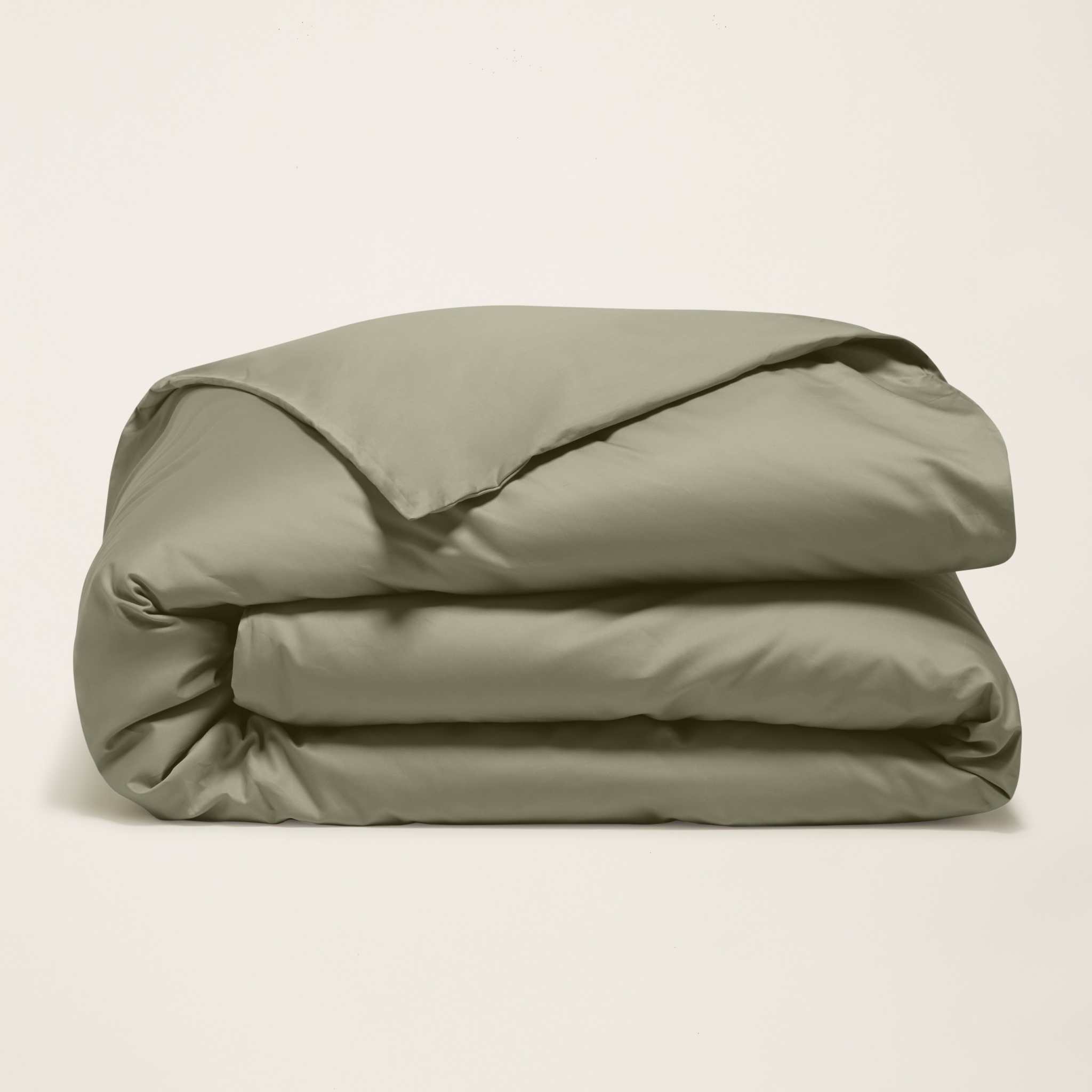 Duvet cover in Luxe Australian Sateen, muted sage green cotton with a smooth finish and softly folded edges