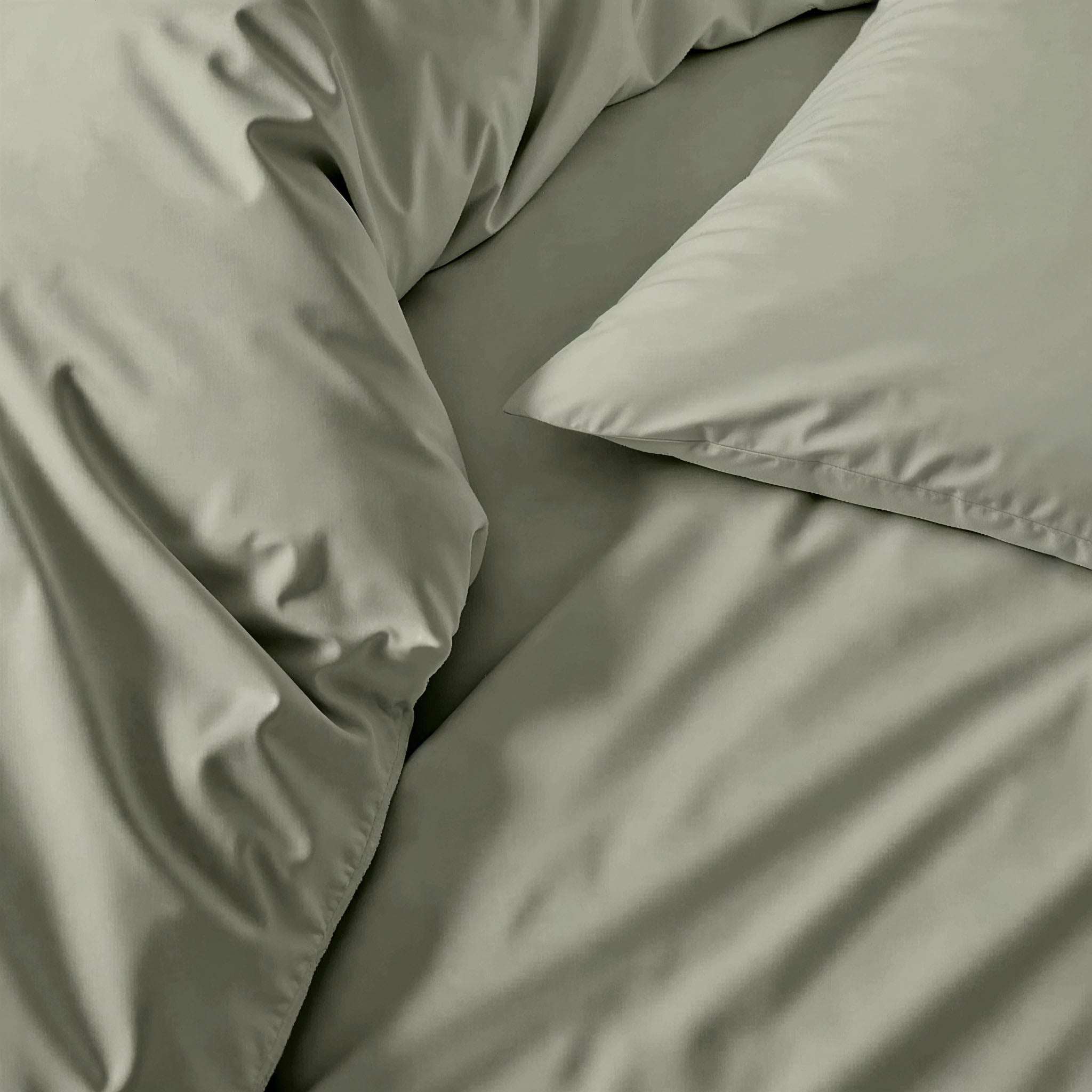 Duvet cover in Luxe Australian Sateen, smooth sage green cotton with a subtle sheen and soft folds