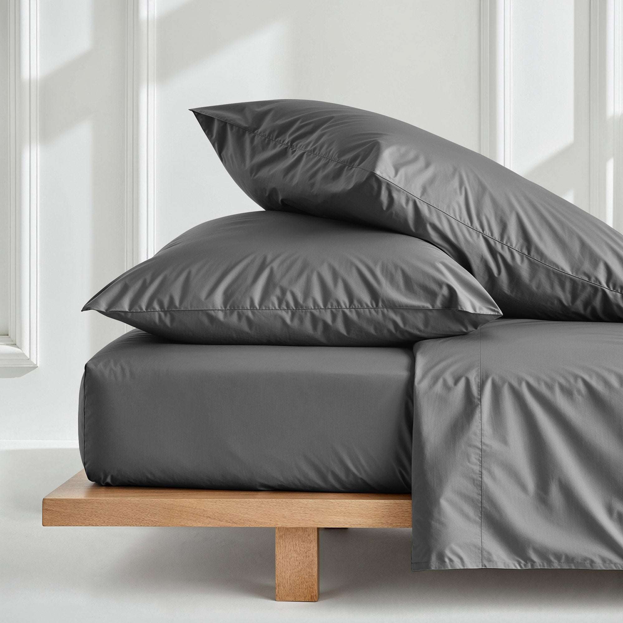 Luxe Australian Sateen Sheet Set in charcoal gray sateen cotton, with smooth sheets and matching pillowcases