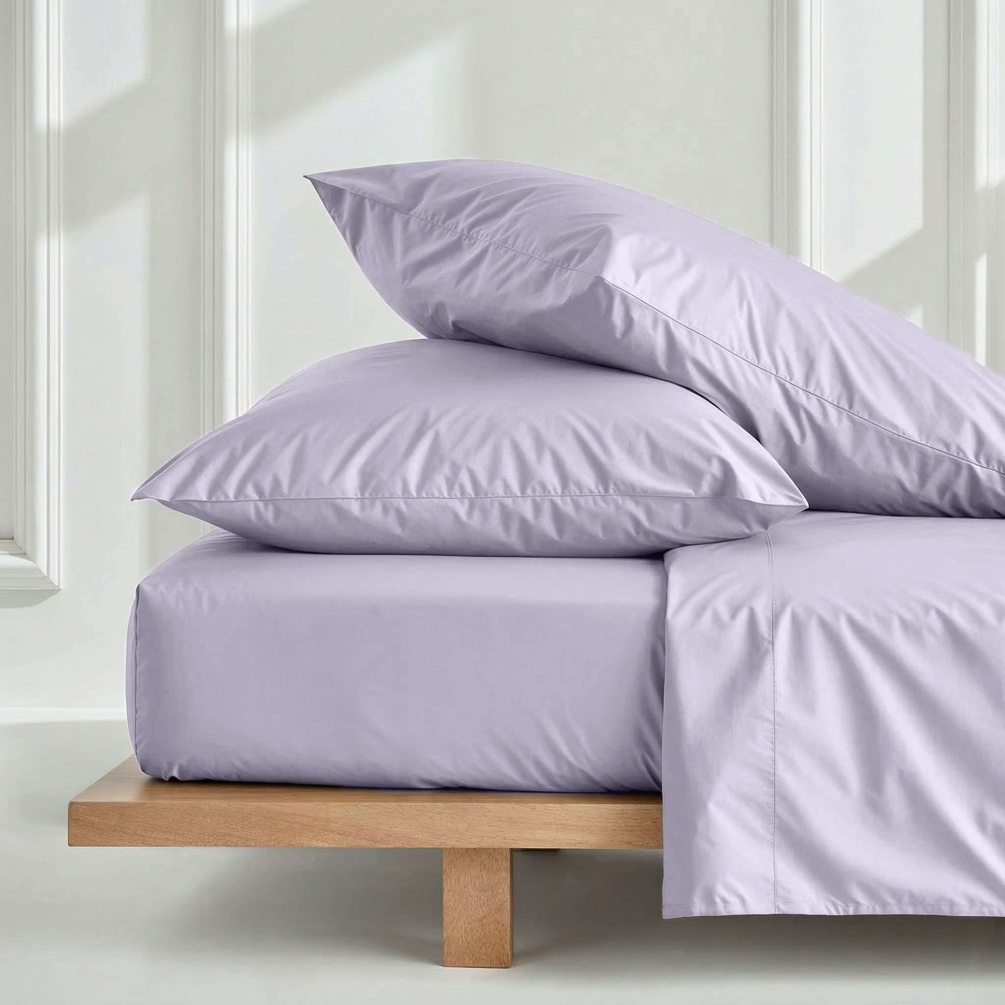 Luxe Australian Sateen Sheet Set in pale lavender cotton sateen, with smooth sheets and plump pillowcases