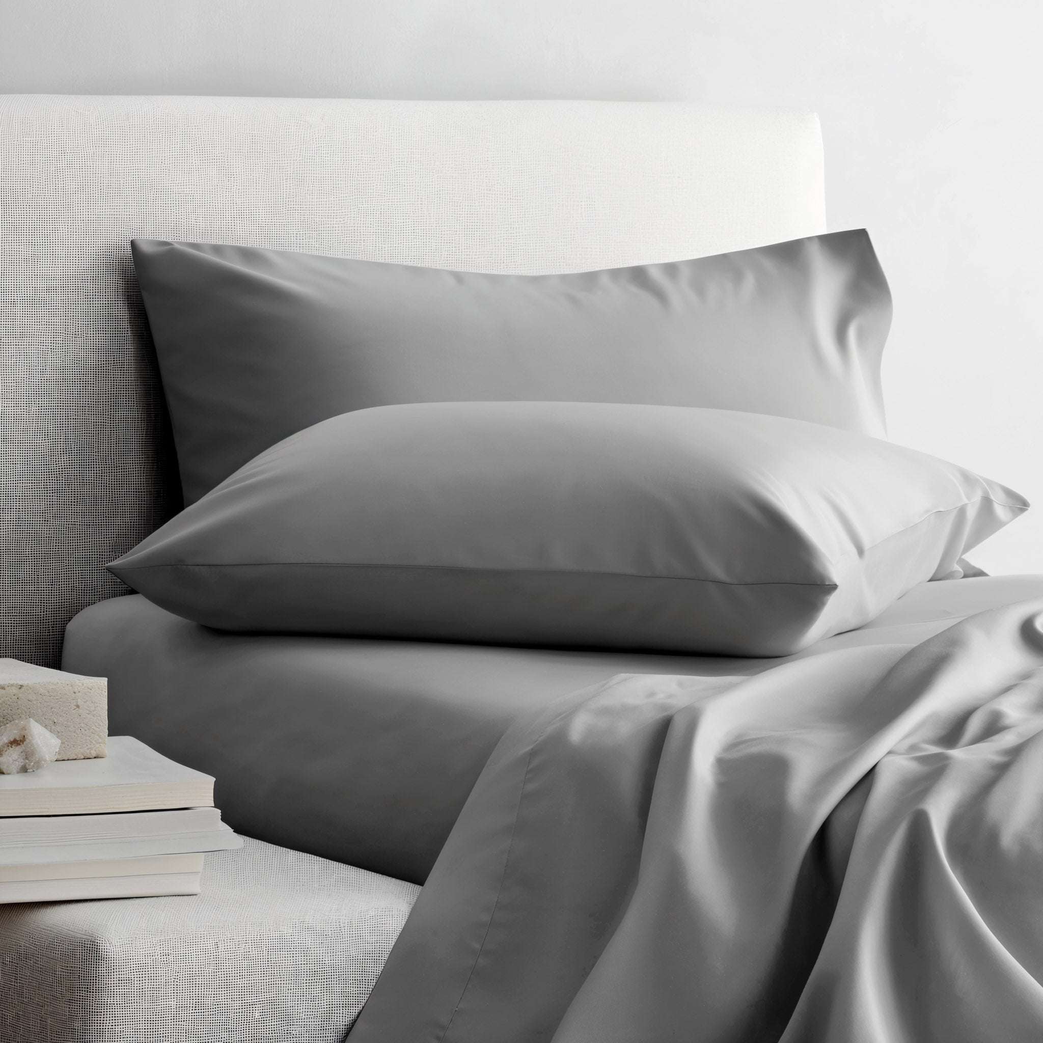 Luxe Australian Sateen Sheet Set in smooth silver-gray cotton, featuring softly lustrous sheets and matching plump pillowcases