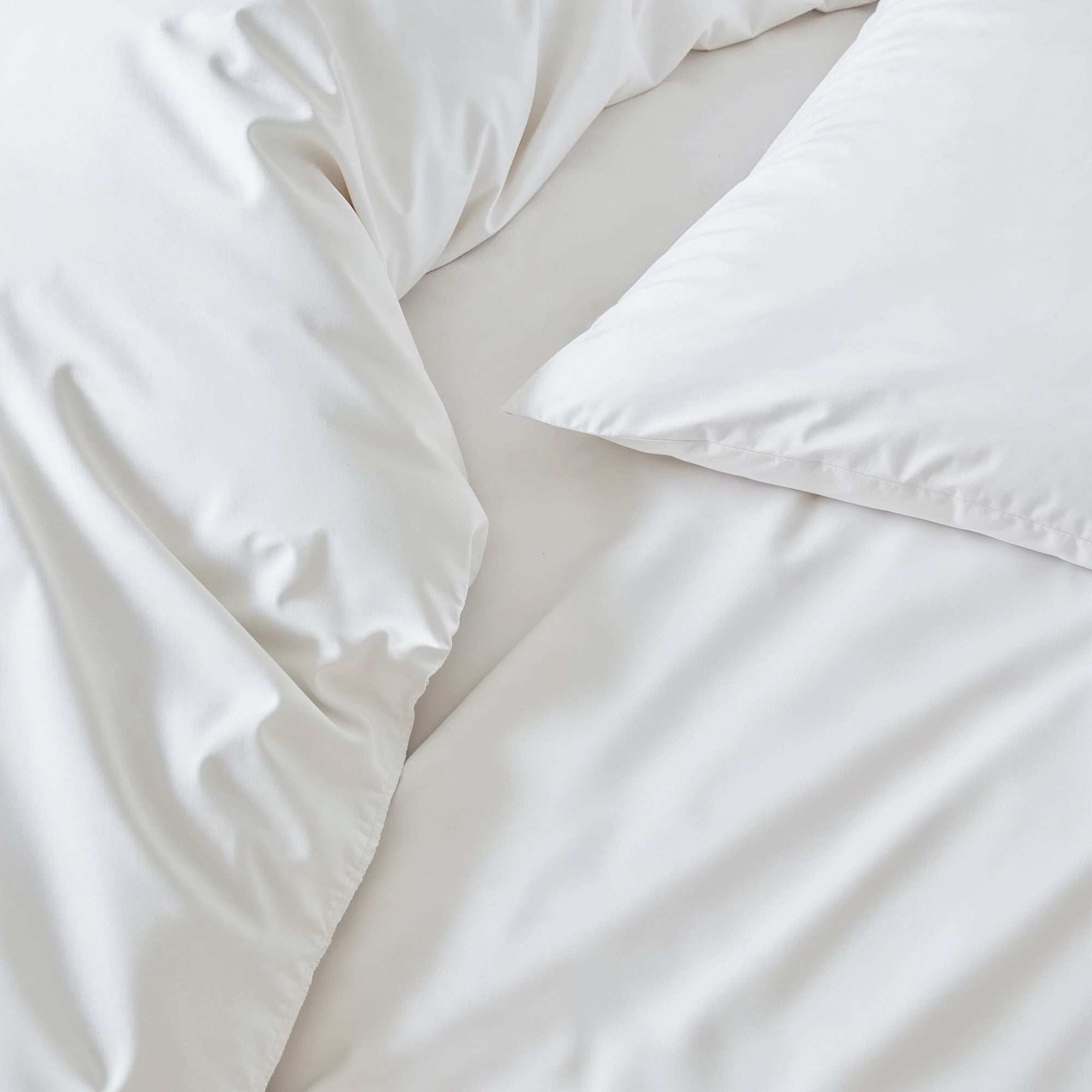 Luxe Australian Sateen Sheet Set in white cotton with a smooth, softly lustrous finish and matching pillowcase
