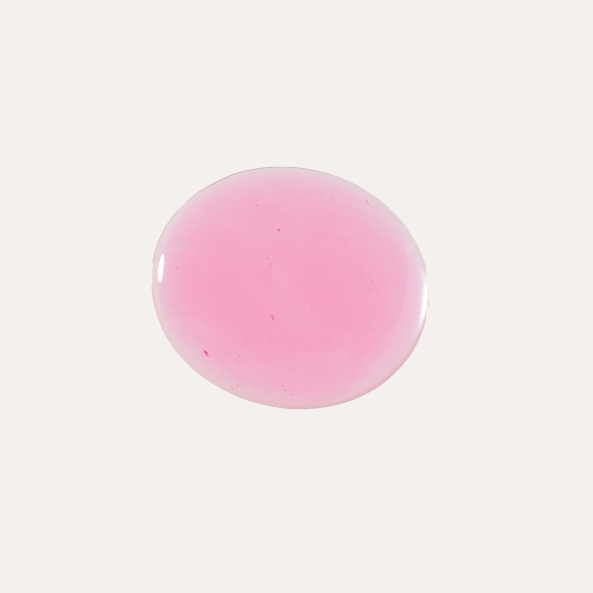 Luxe Lip Nourishing Oil swatch in translucent rosy pink with a smooth, glossy finish