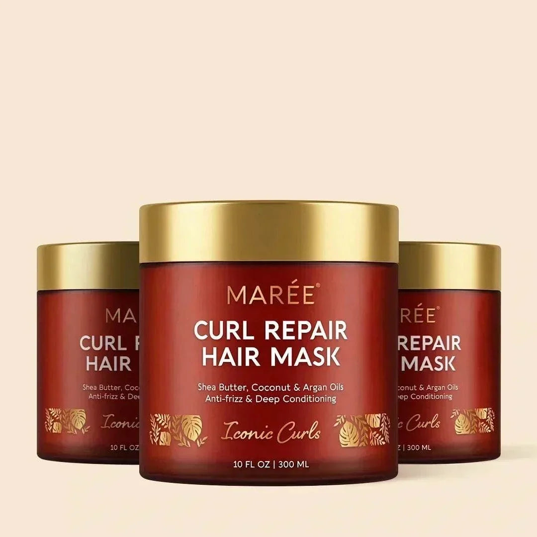 Maree Curl Repair Mask hair treatment jars in deep red with gold lids and Iconic Curls detailing