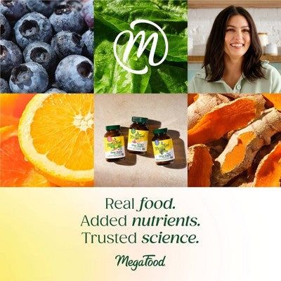 MegaFood Vegan B12 supplement bottles surrounded by fresh blueberries, spinach, orange slices, and turmeric roots promoting natural ingredients and nutrients