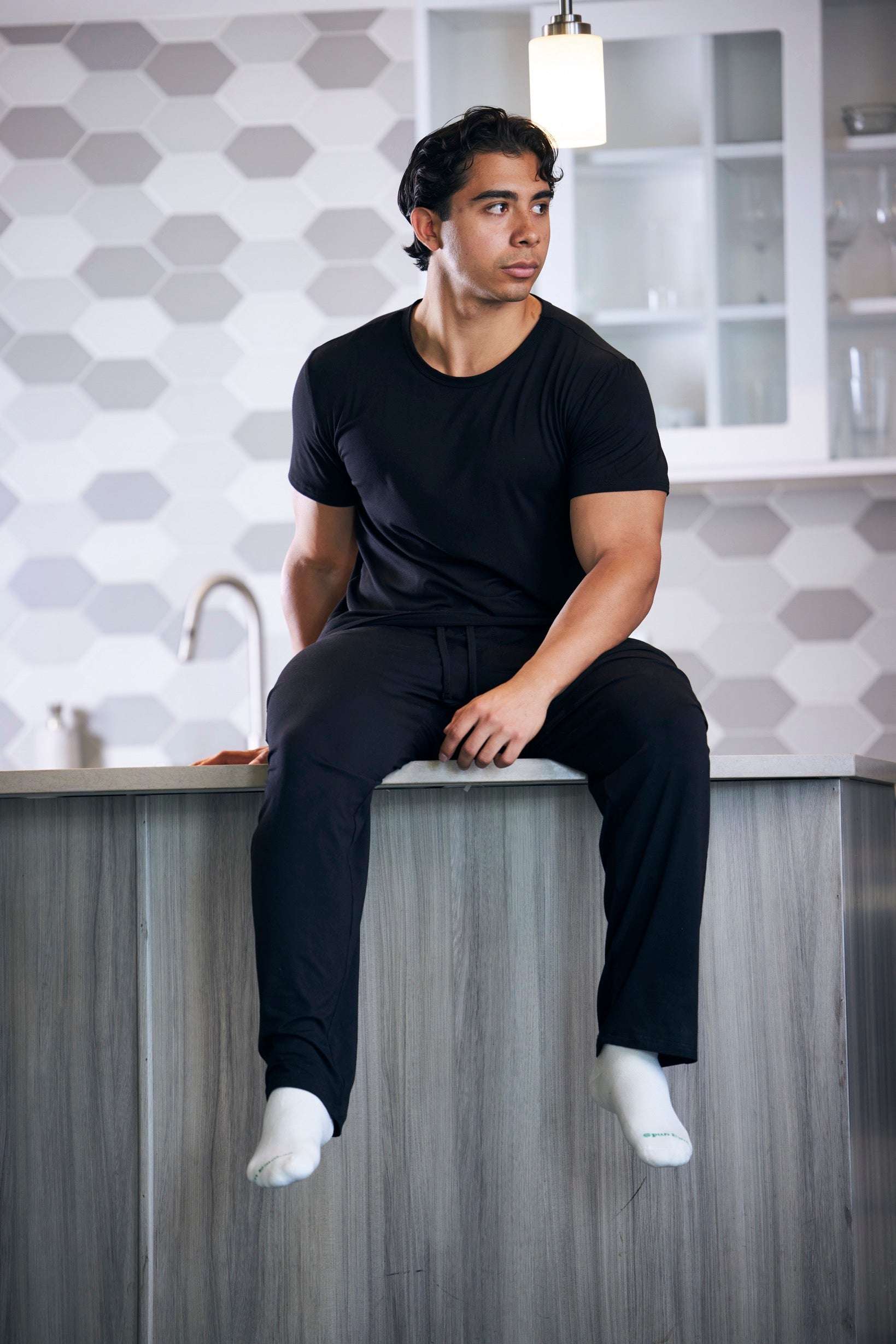 Men's Soft Bamboo Lounge Pajama Set in solid black, with a short-sleeve crew-neck top and matching pants