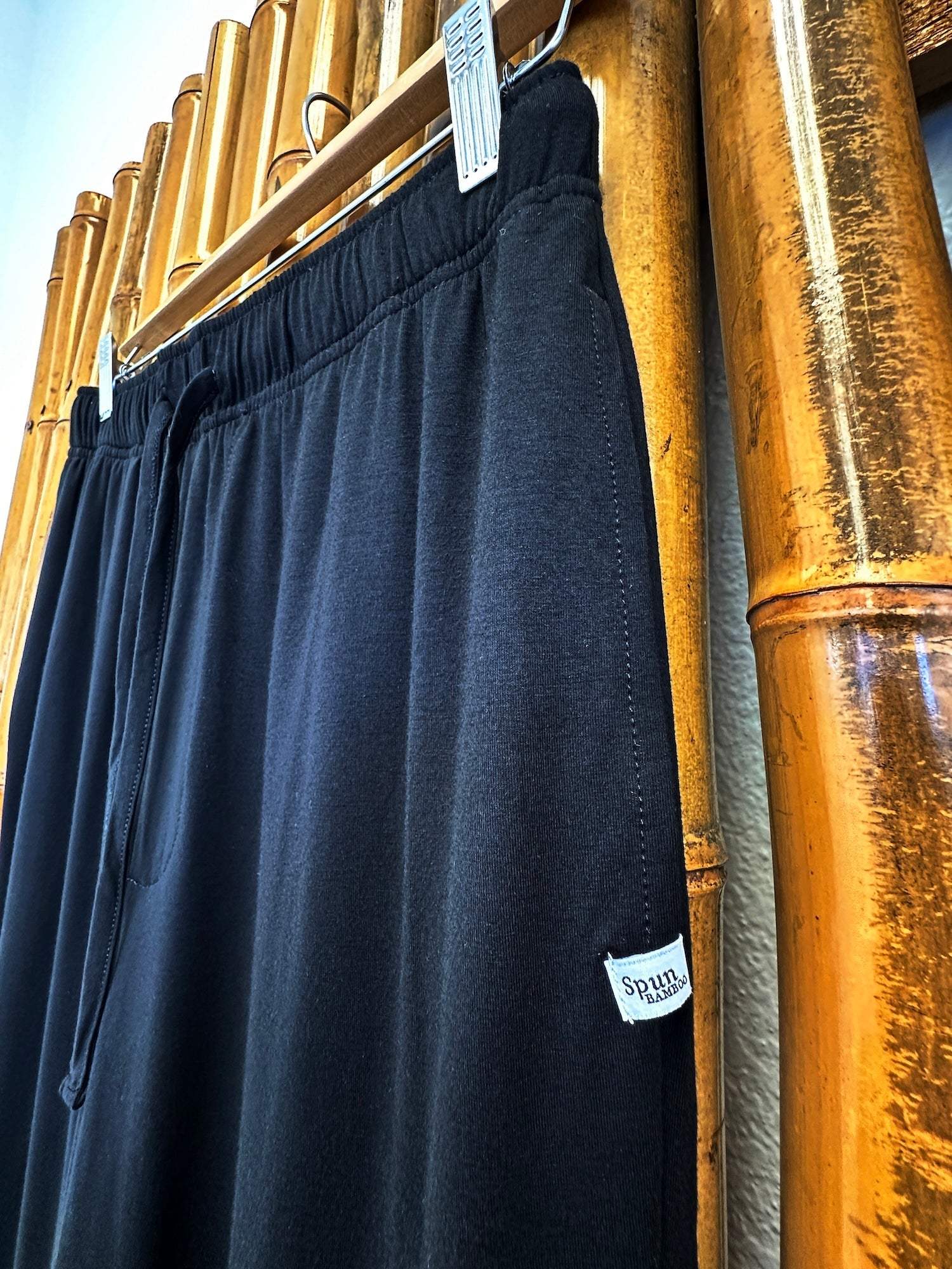Men's Soft Bamboo Lounge Pajama Pants in solid navy fabric with an elastic waistband, drawstring and side pocket