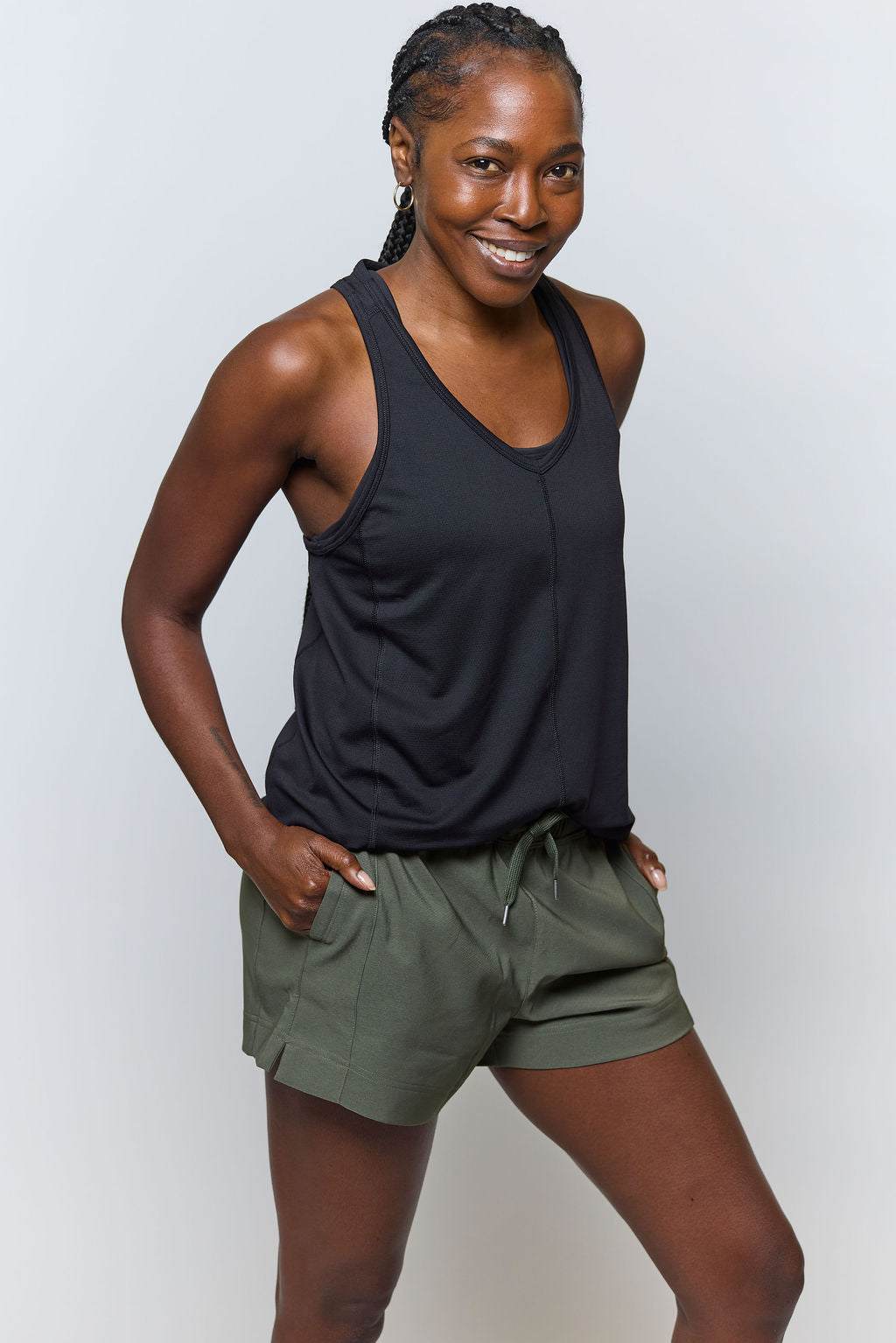 Mesh It To Me Tank in black with a soft mesh texture, scoop neckline and sleeveless racerback-style cut