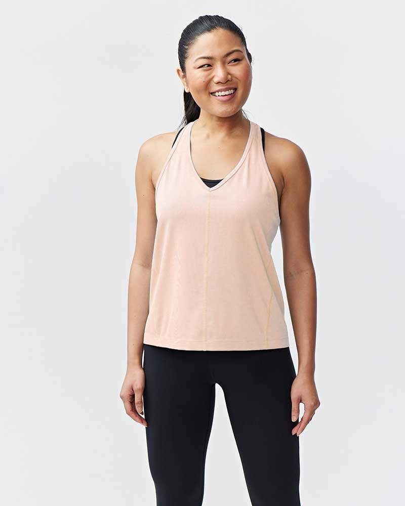 Mesh It To Me Tank in pale pink with a lightweight mesh fabric, scoop neckline, and relaxed sleeveless fit