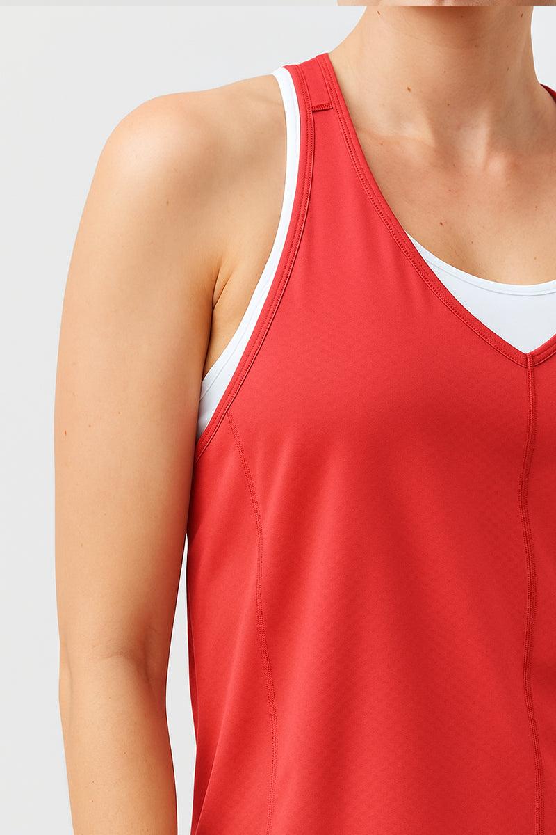 Mesh It To Me Tank in bright red mesh with a V-neck, wide straps and shaped hem, layered over a white sports bra