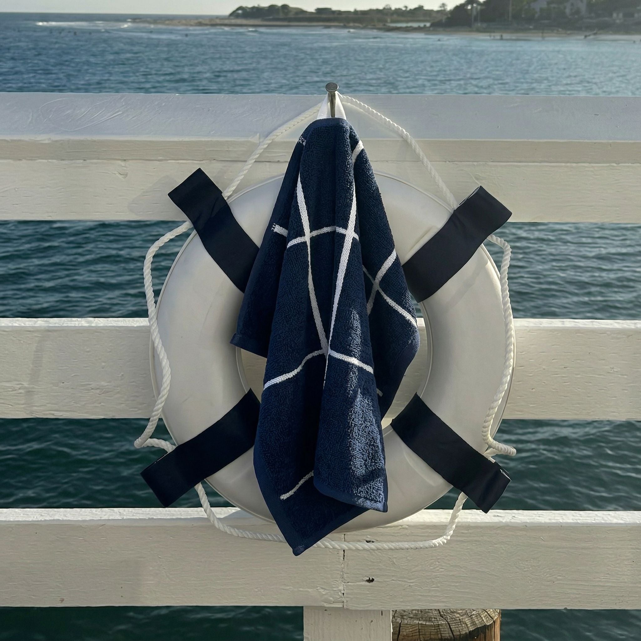 Miramar Australian cotton towels with navy blue and white windowpane grid