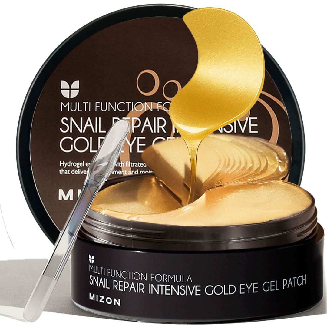 Mizon eye patch golden hydrogel under-eye patches with shiny smooth texture in black round container with clear spatula