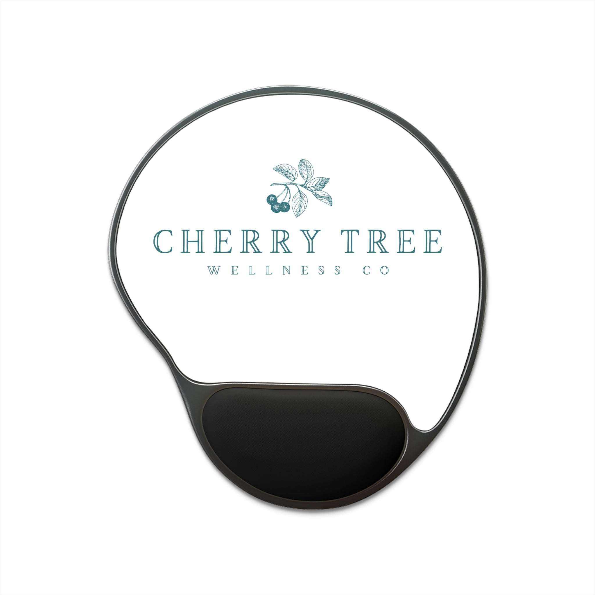 Mouse Pad With Wrist Rest featuring a black foot-shaped base, smooth wrist cushion, and white cherry tree logo insert