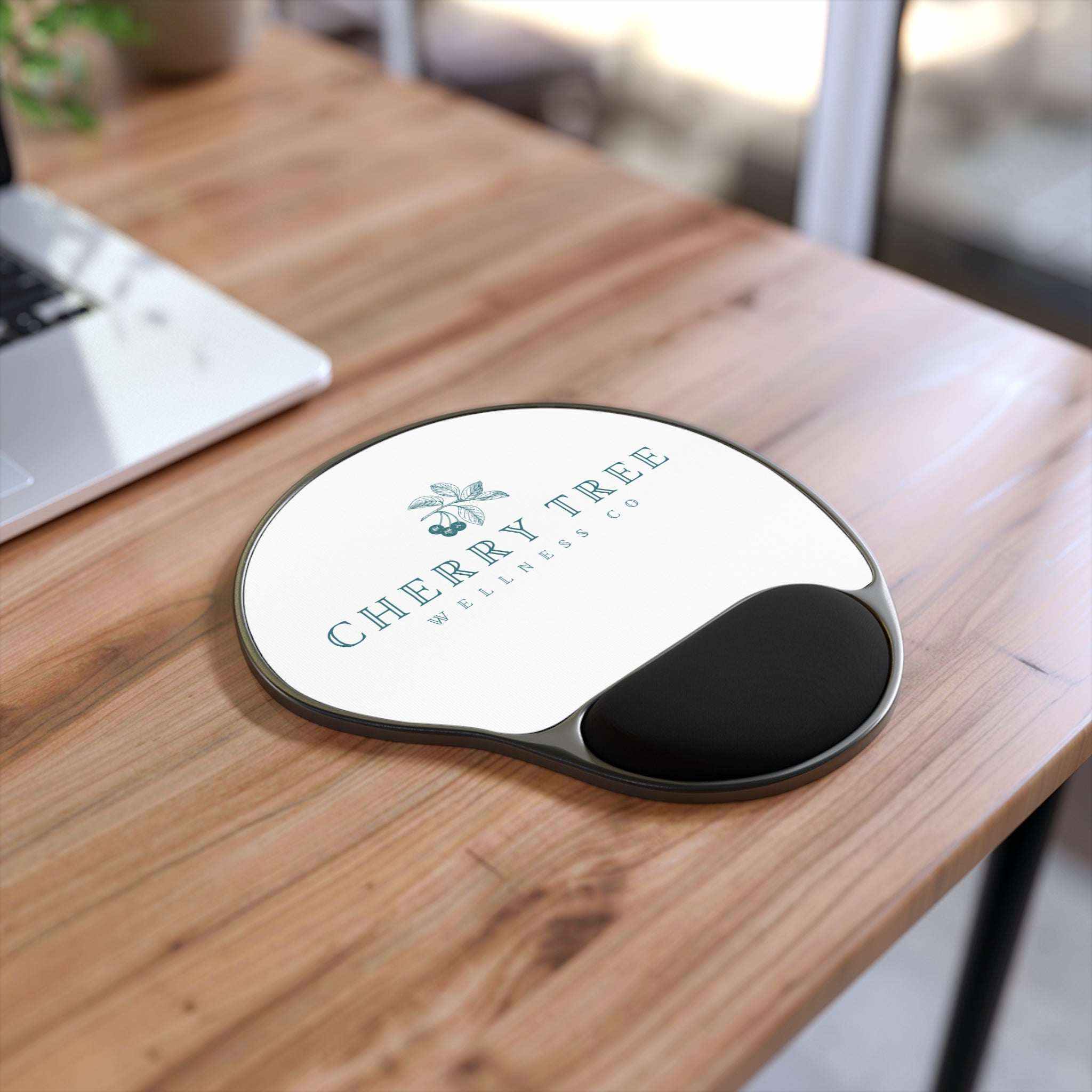 Mouse Pad With Wrist Rest featuring a white cherry tree print and black ergonomic memory foam support