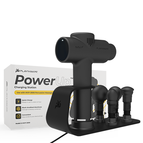 MVP+ Percussion Massage System in black with multiple massage attachments and PowerUp charging station