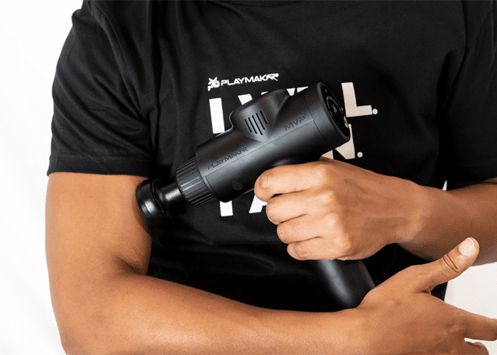 MVP+ Percussion Massage System, black handheld percussion massager with ergonomic grip and round attachment head