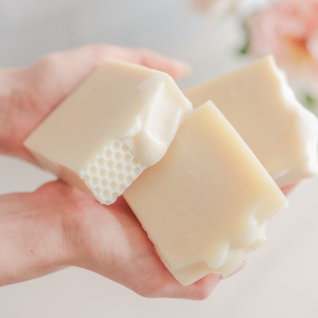 Natural Fragrance Free Handmade Soap bars in creamy ivory, with smooth surfaces and honeycomb-textured end pieces