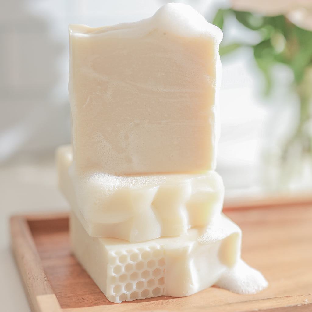 Natural Fragrance Free Handmade Soap bars in creamy ivory tallow, goat milk, and honey with textured layers