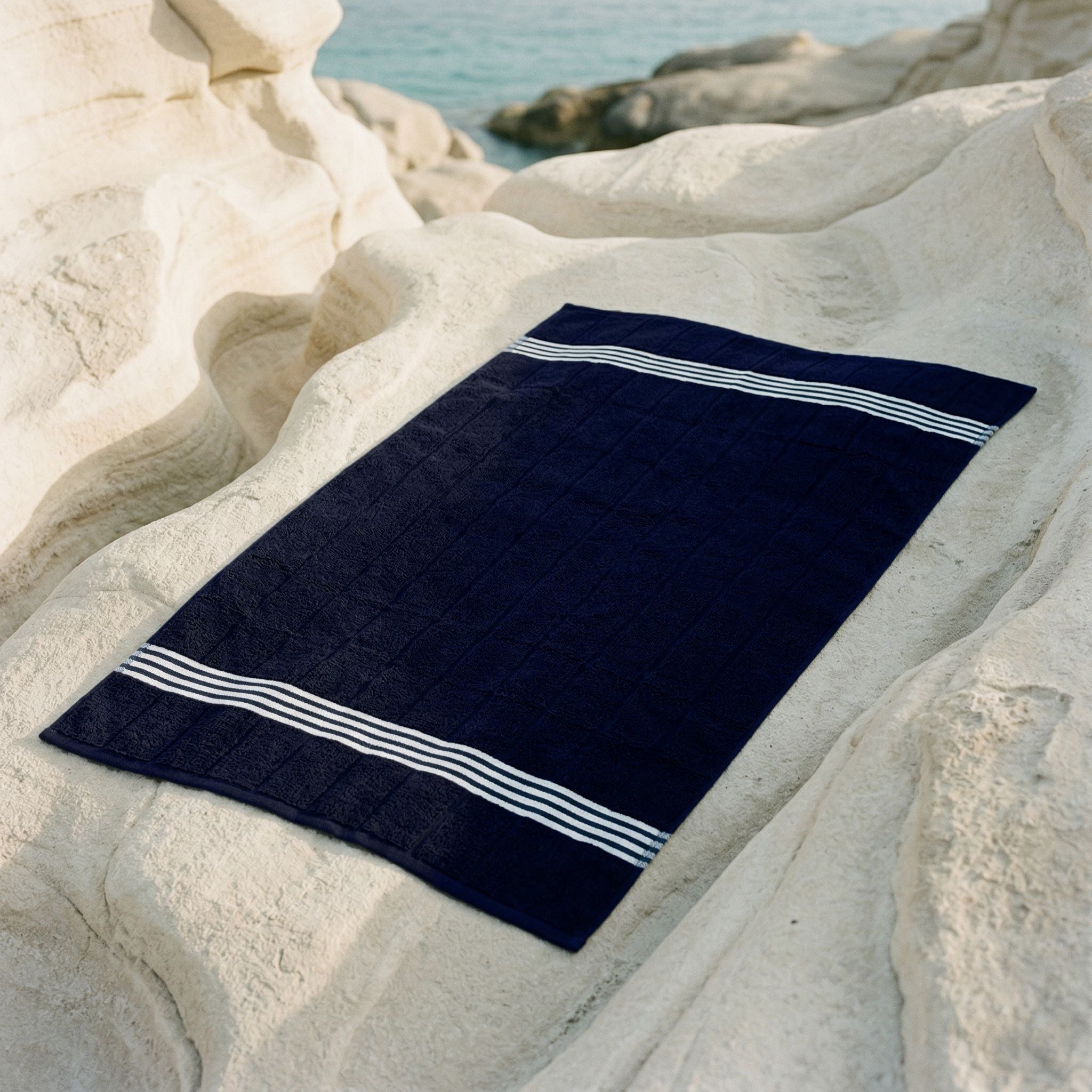 Nautilus Australian cotton towels with navy and white stripes